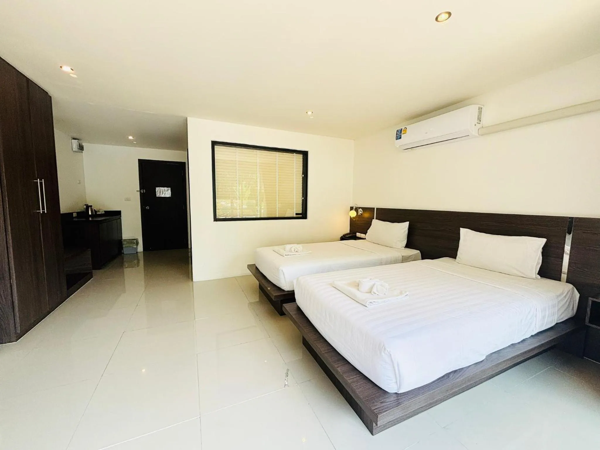 Bed in Ocean View Treasure Residence