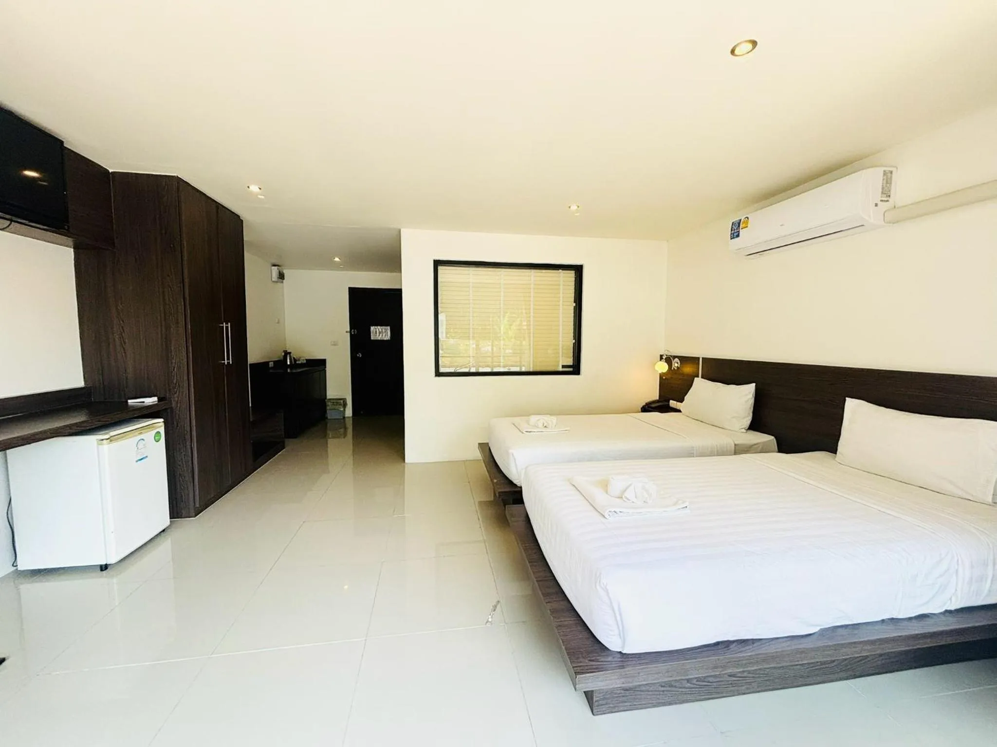 Bed in Ocean View Treasure Residence