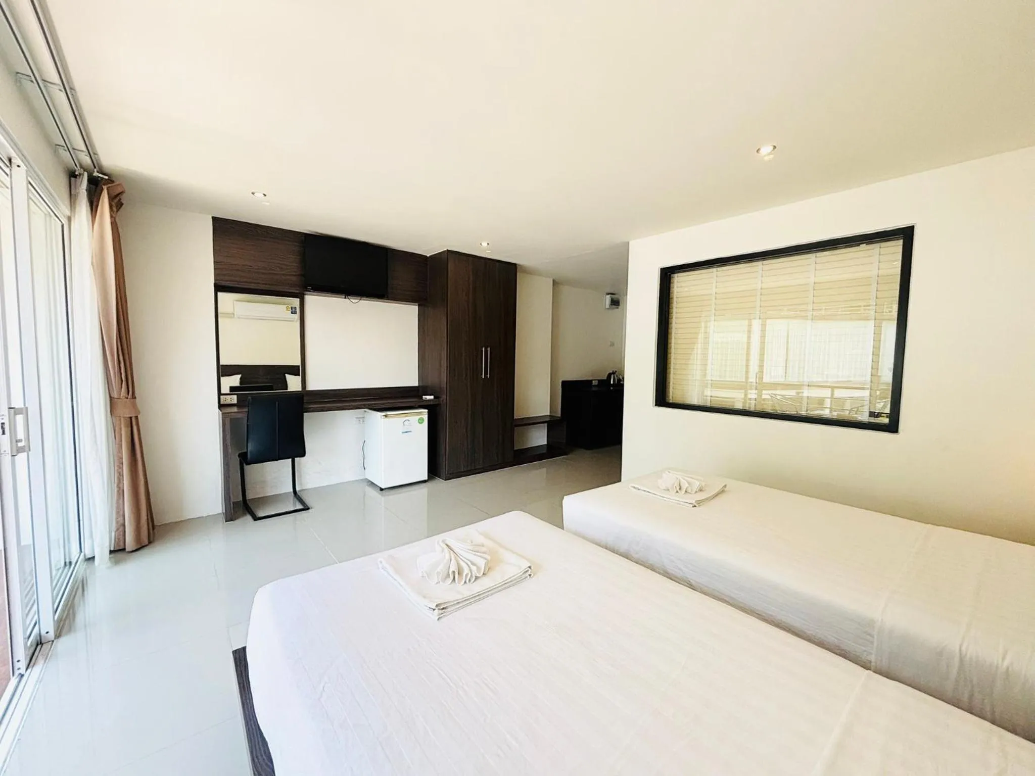 Bed in Ocean View Treasure Residence