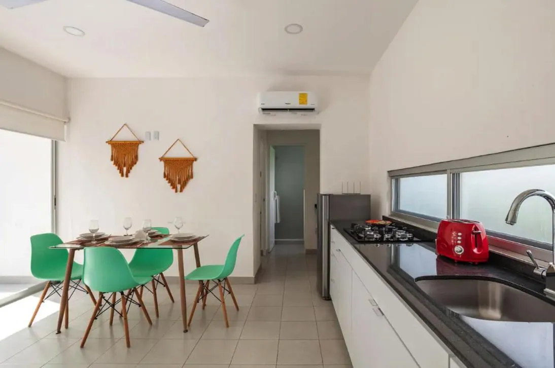 Kitchen or kitchenette in Papaya Suites Diamante - Adults Only