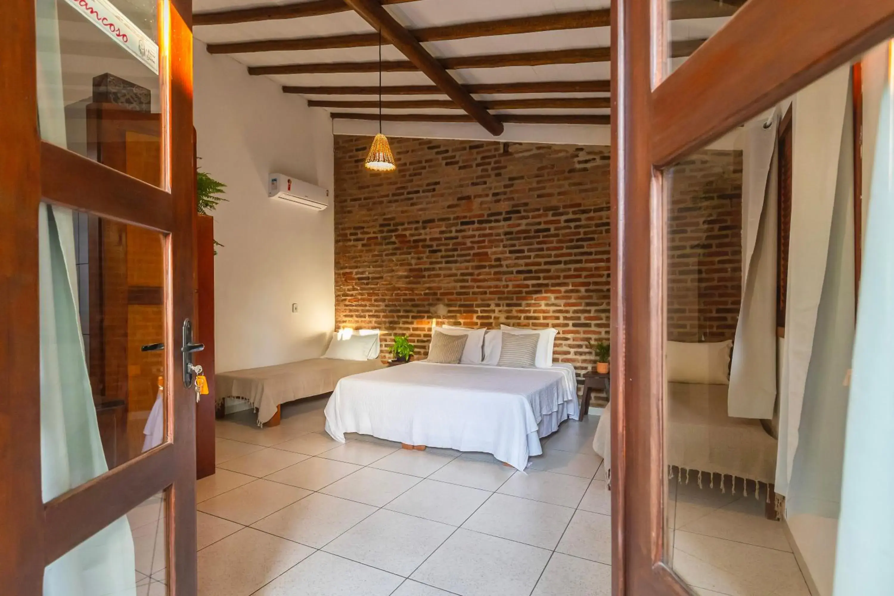 Quadruple Room with Garden View in Pousada Arraial dos Sonhos Quadruple Room with Garden View in Pousada Arraial dos Sonhos