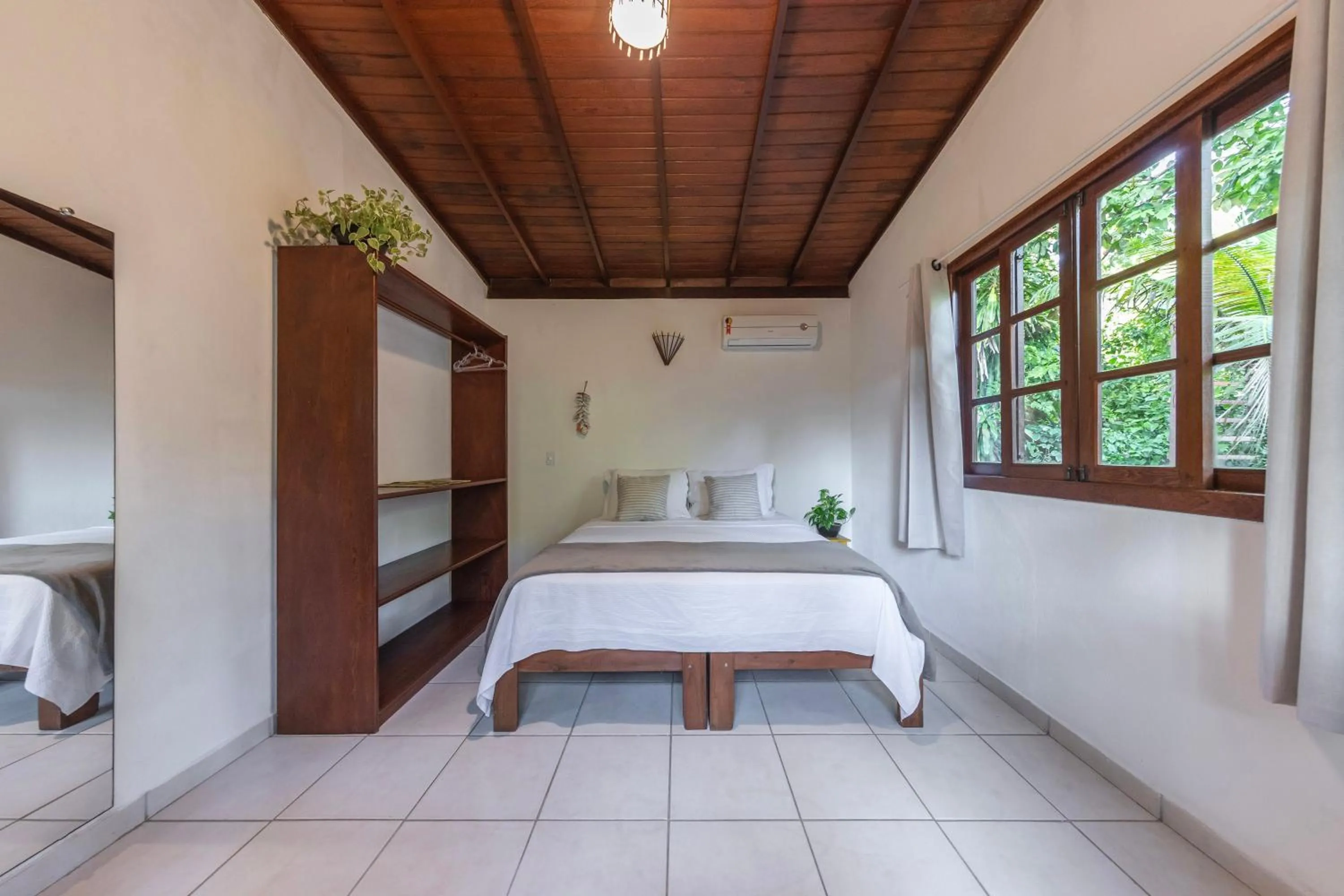 Bed in Pousada Arraial dos Sonhos