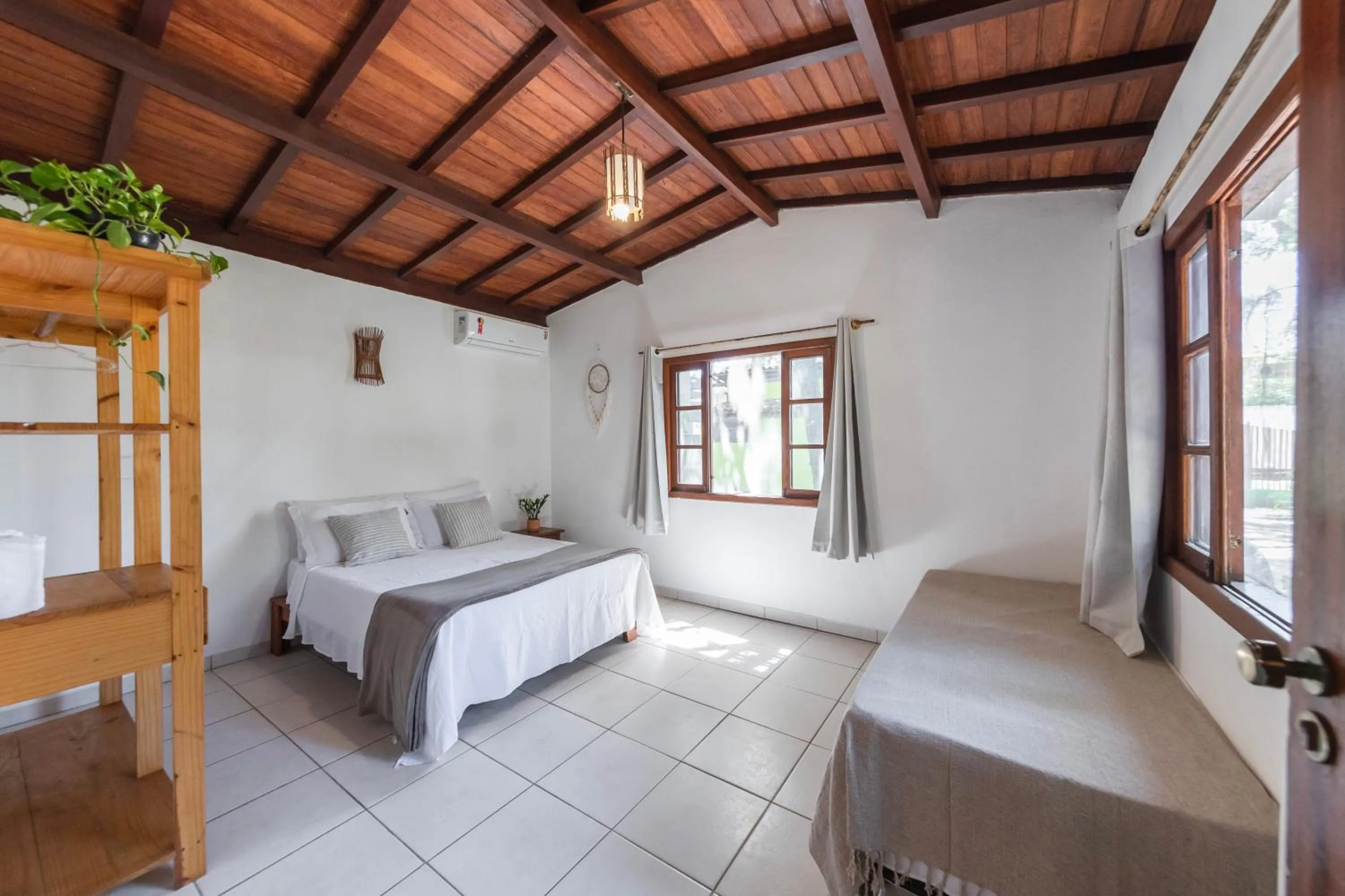 Bed in Pousada Arraial dos Sonhos