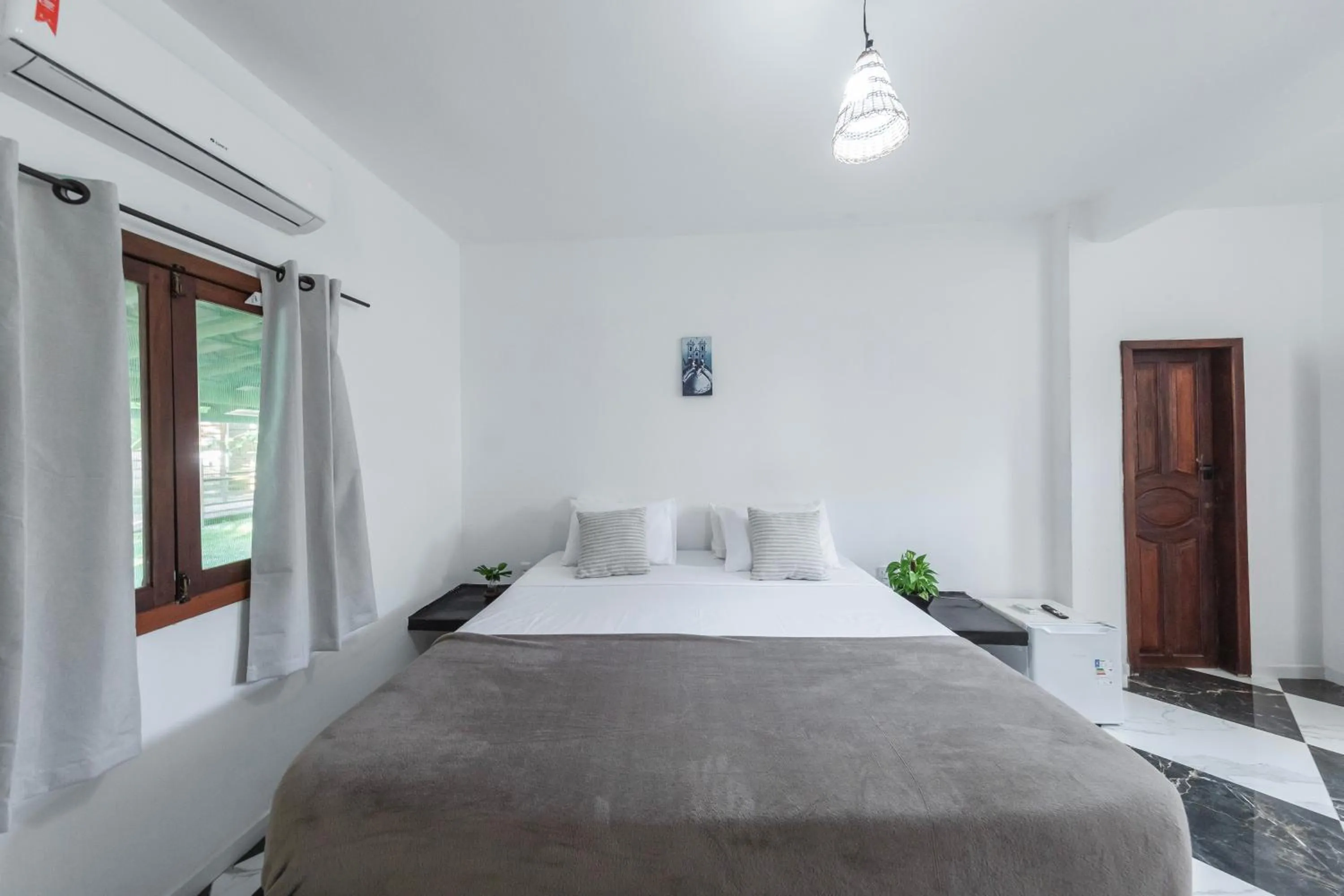 Bed in Pousada Arraial dos Sonhos