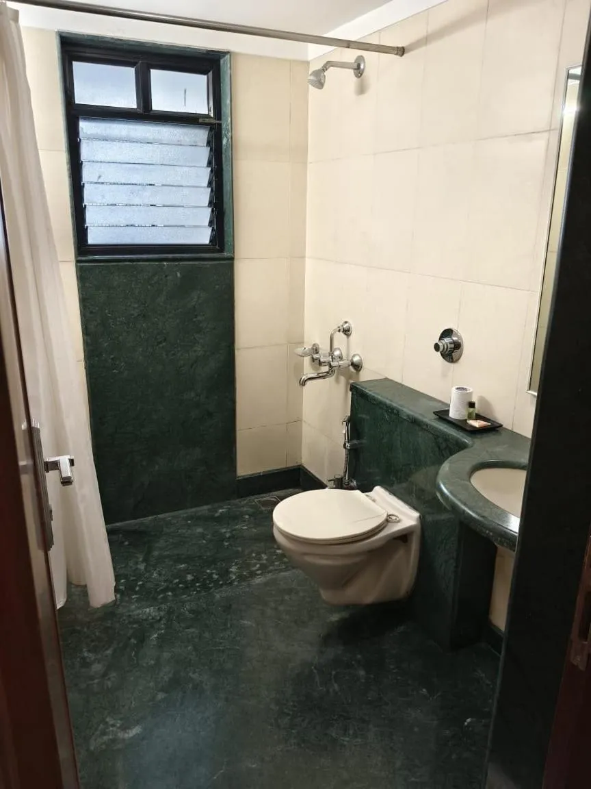 Bathroom in Magnus Fortune House Business Hotel , Magarpatta