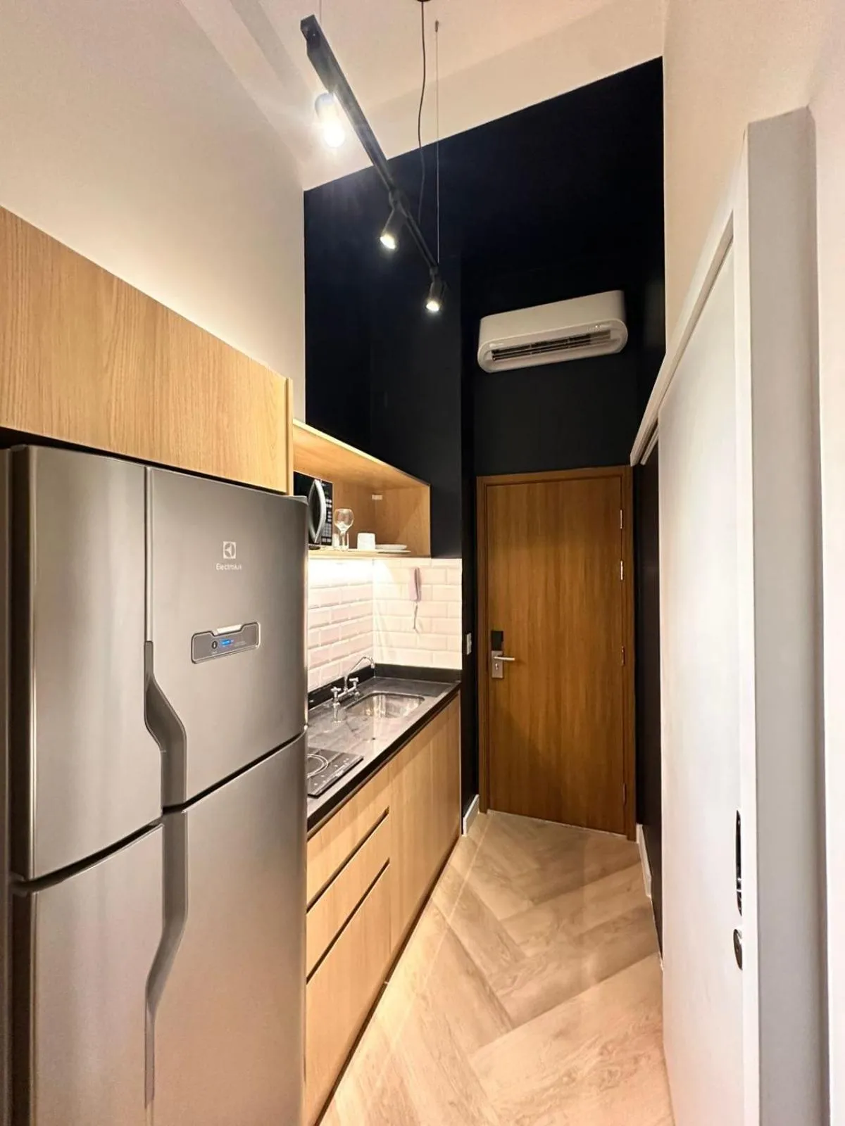Kitchen or kitchenette in Studio Moderno ao Lado do Allianz Parque com Piscina & Academia