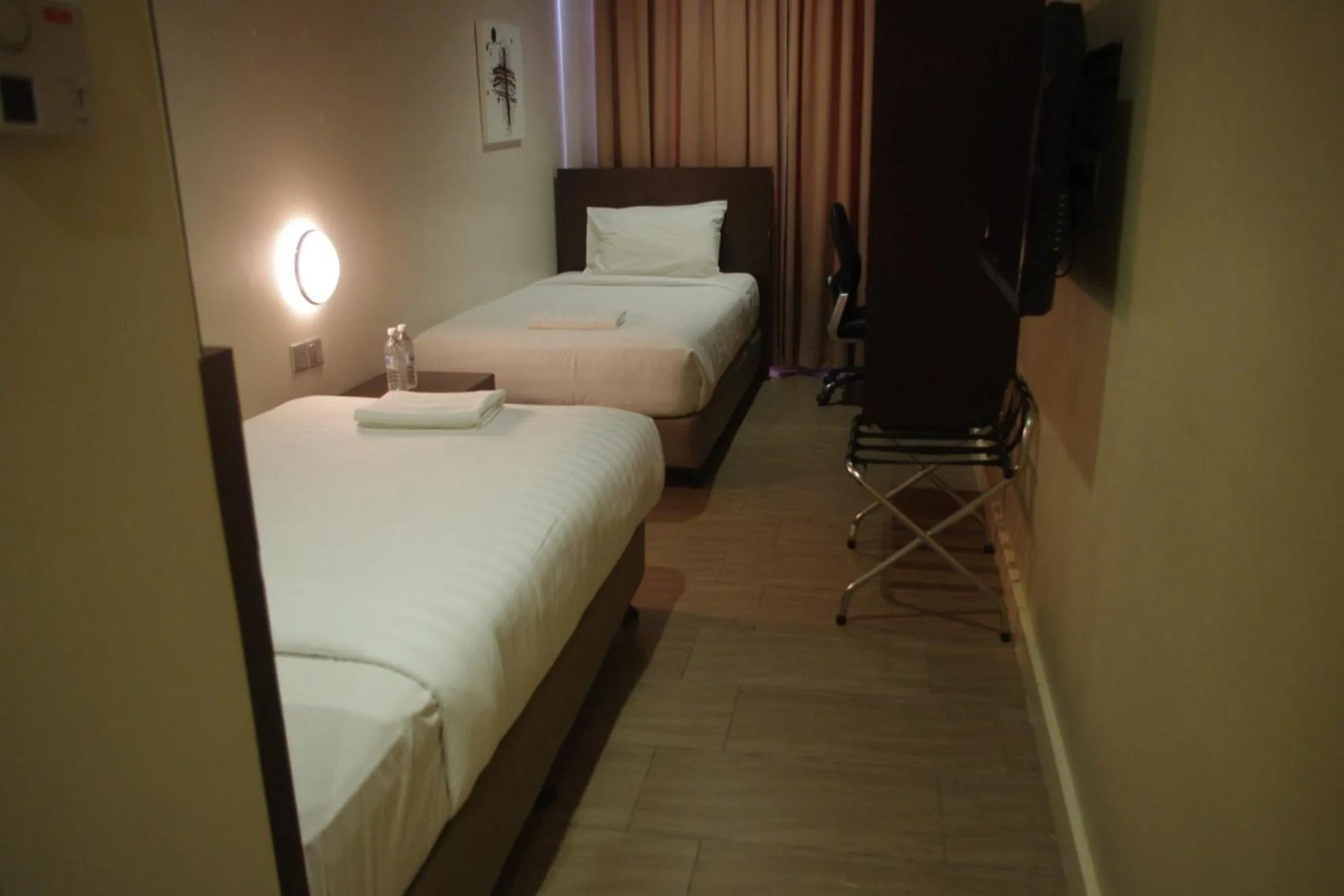 Bed in 101 Hotel Bintulu