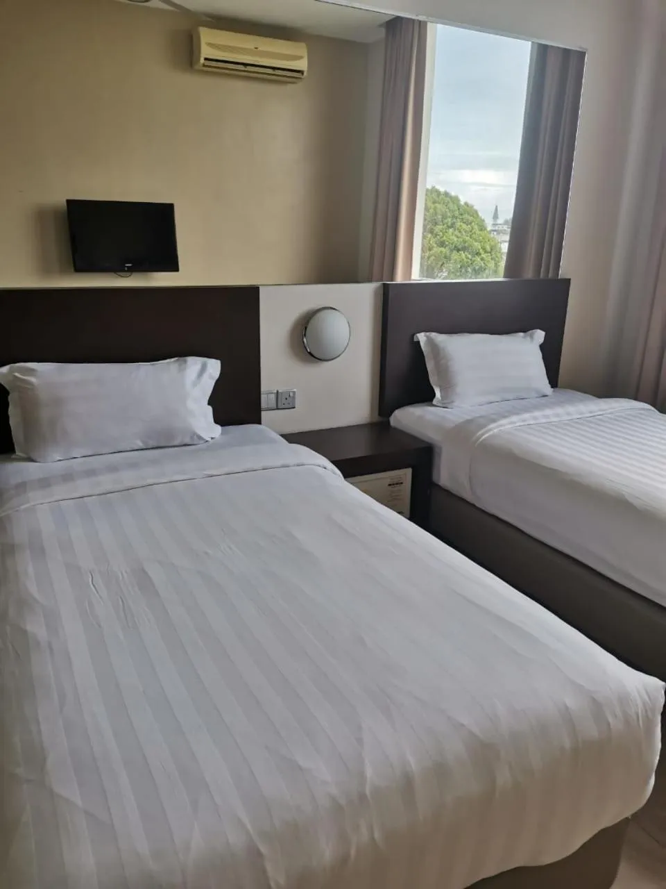 Bed in 101 Hotel Bintulu