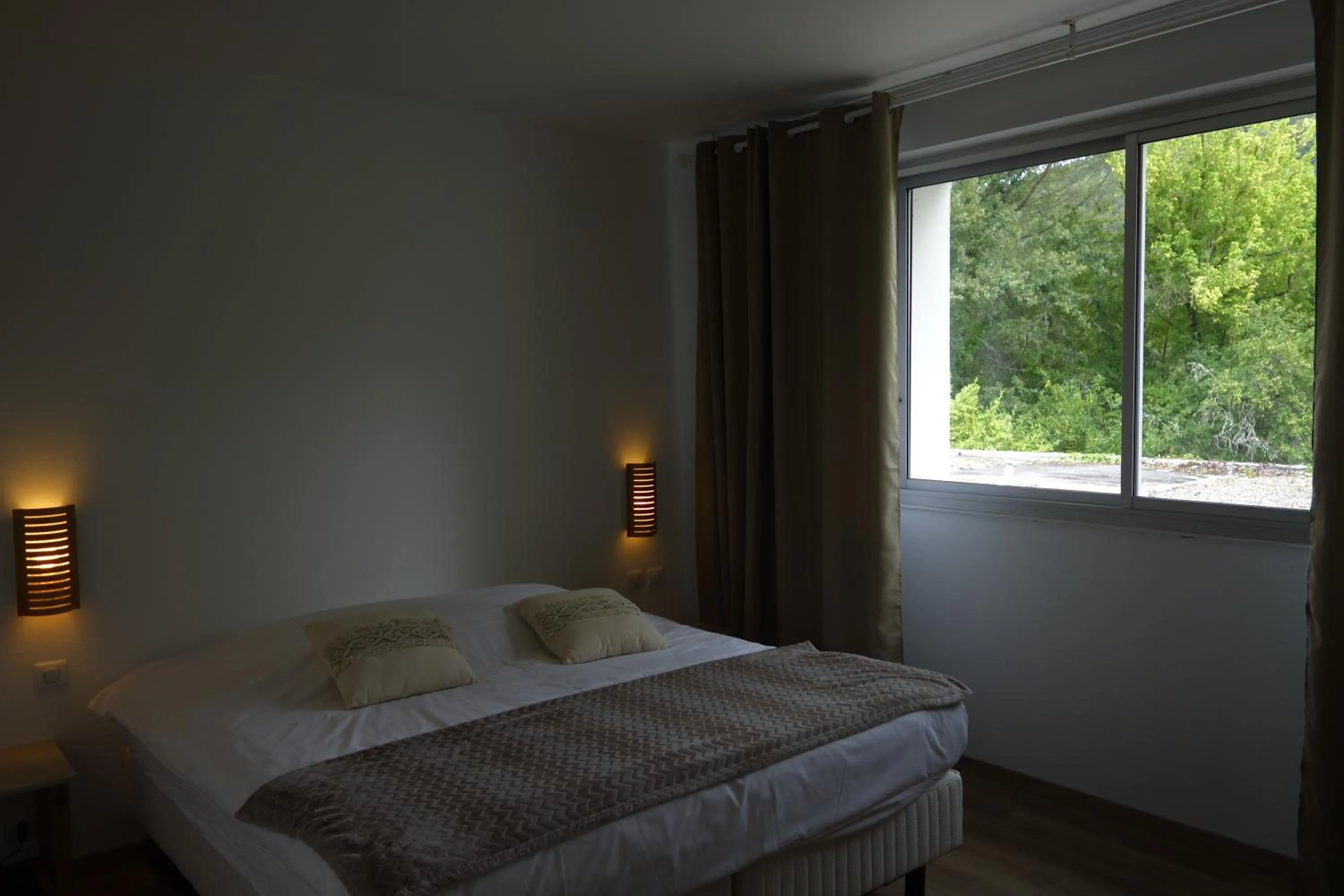 Bed in Hôtel La Ségalière Spa Bar