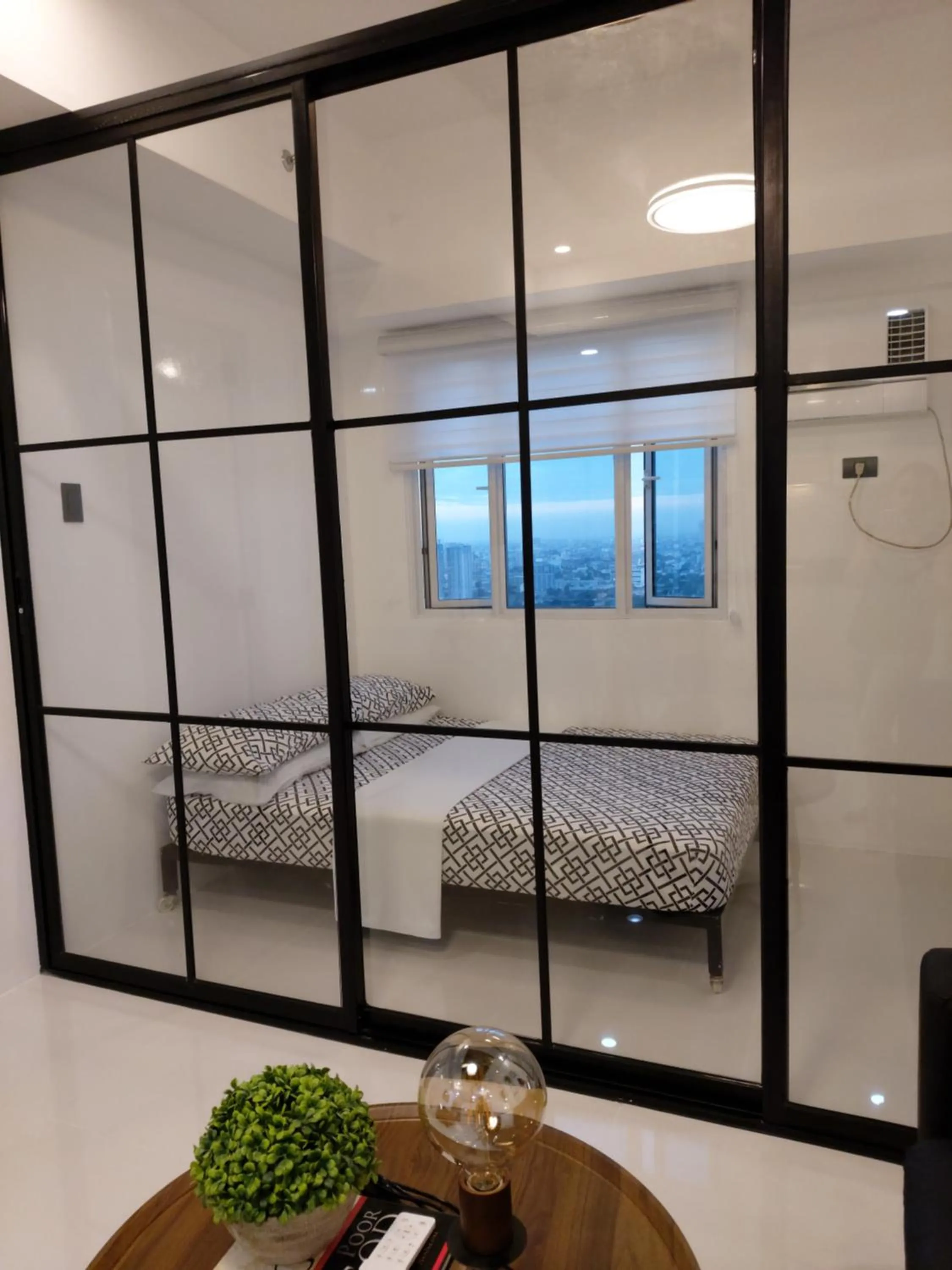 Bed in Condo Studio Luxe in Princeton Residences