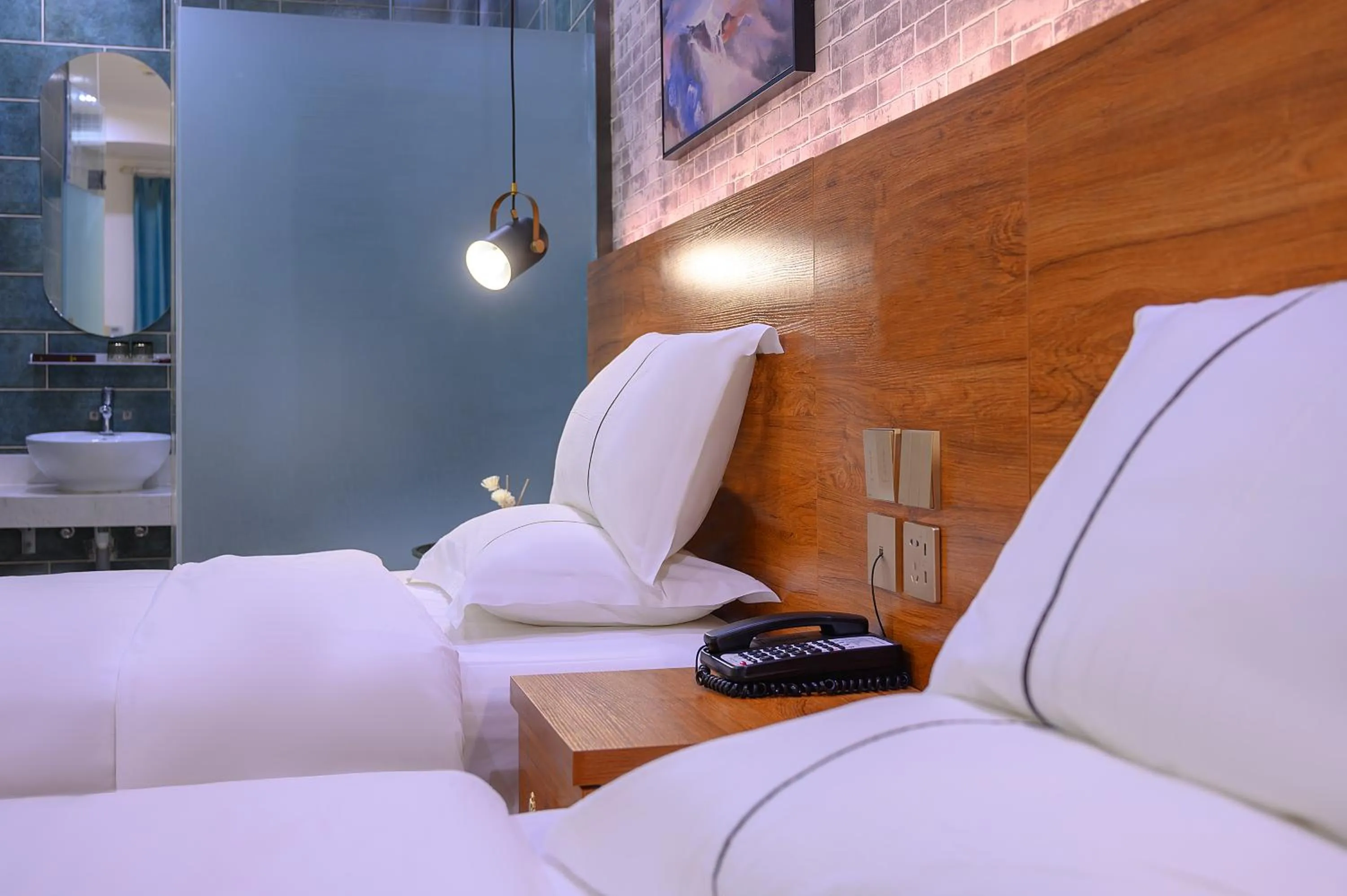 Bed in QiQiaoWu Fashion Hotel Beijing Songjiazhuang Subway Station