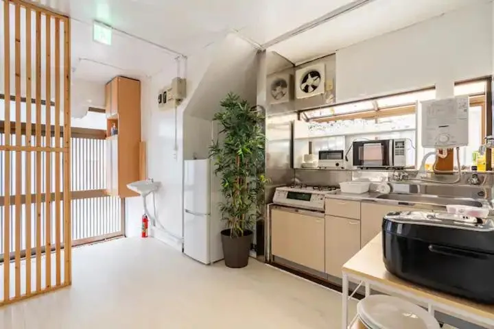 Kitchen or kitchenette in SK House