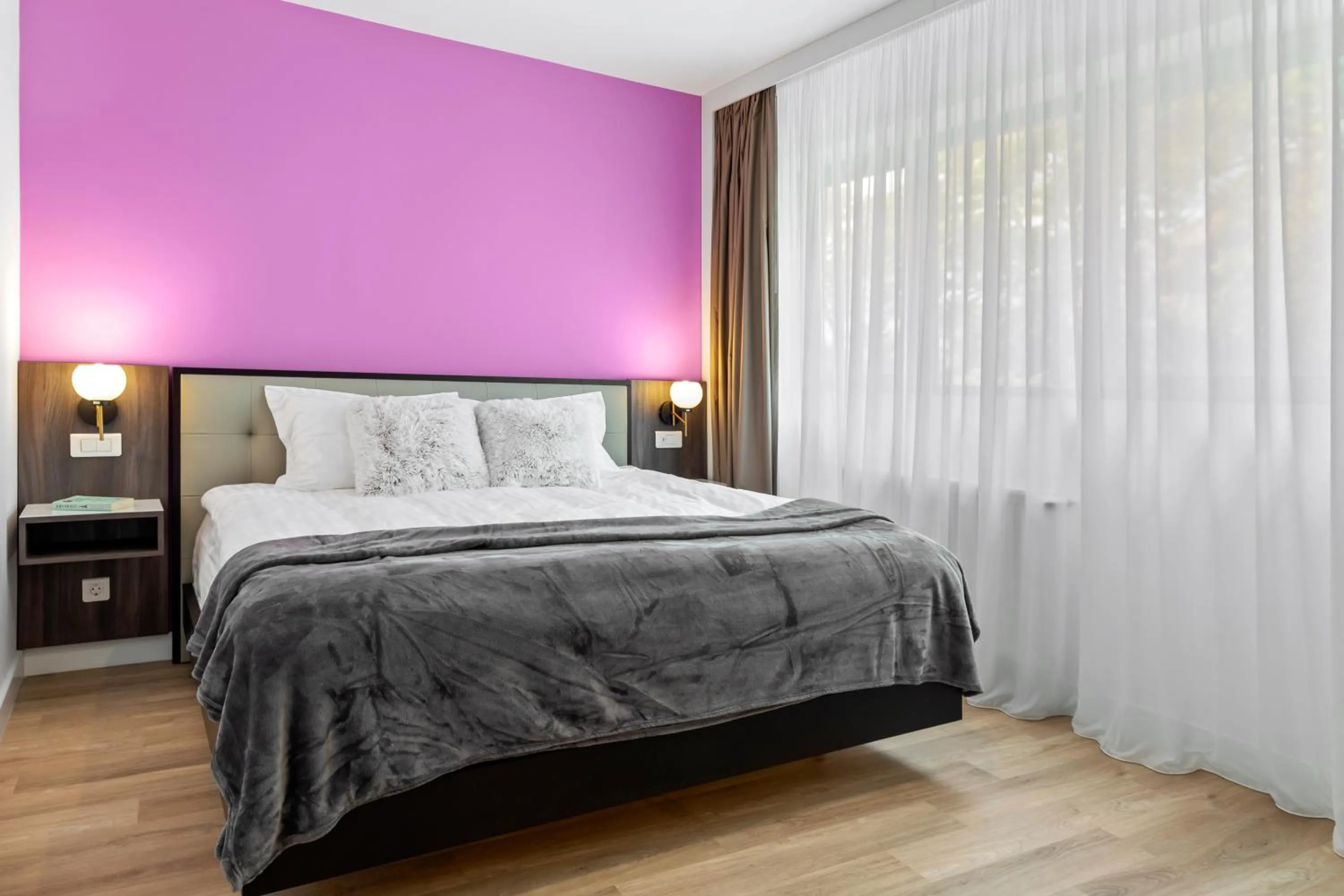 Bed in Uni88 Apart Hotel