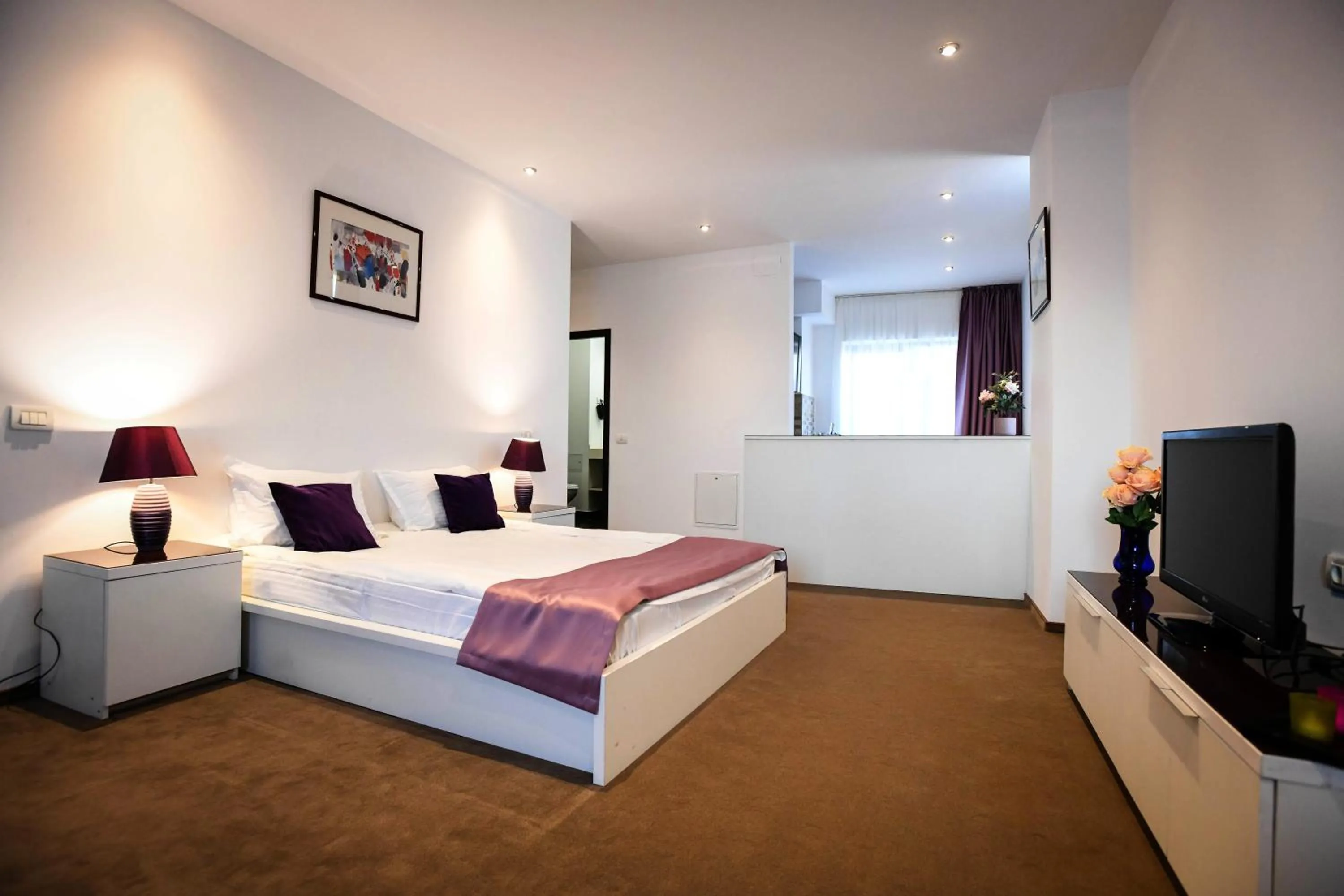 TV and multimedia, Bed in Uni88 Apart Hotel