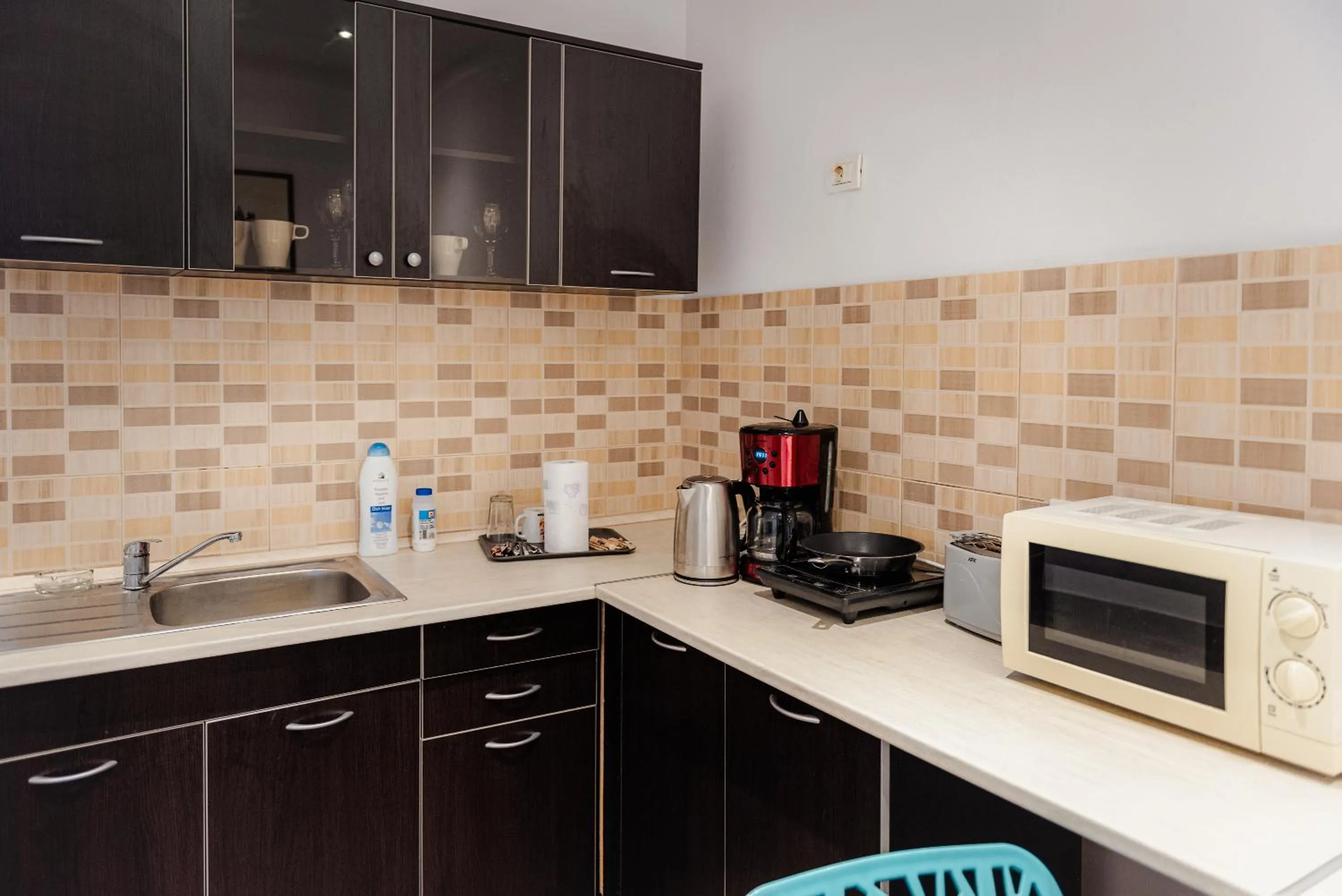 Kitchen or kitchenette in Uni88 Apart Hotel