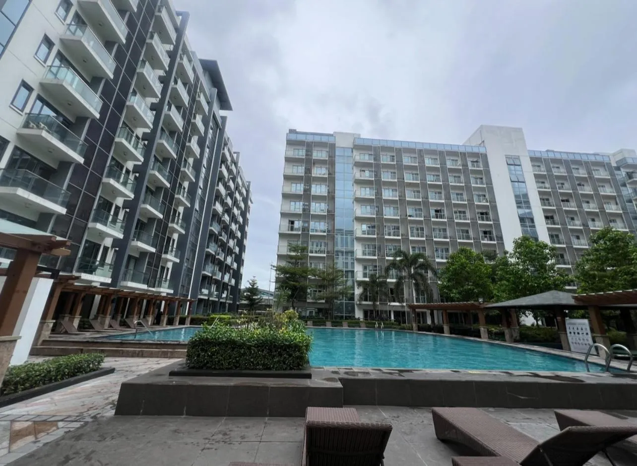 Swimming pool in Cozy Condo at Eighty One Newport Blvd across NAIA Terminal 3