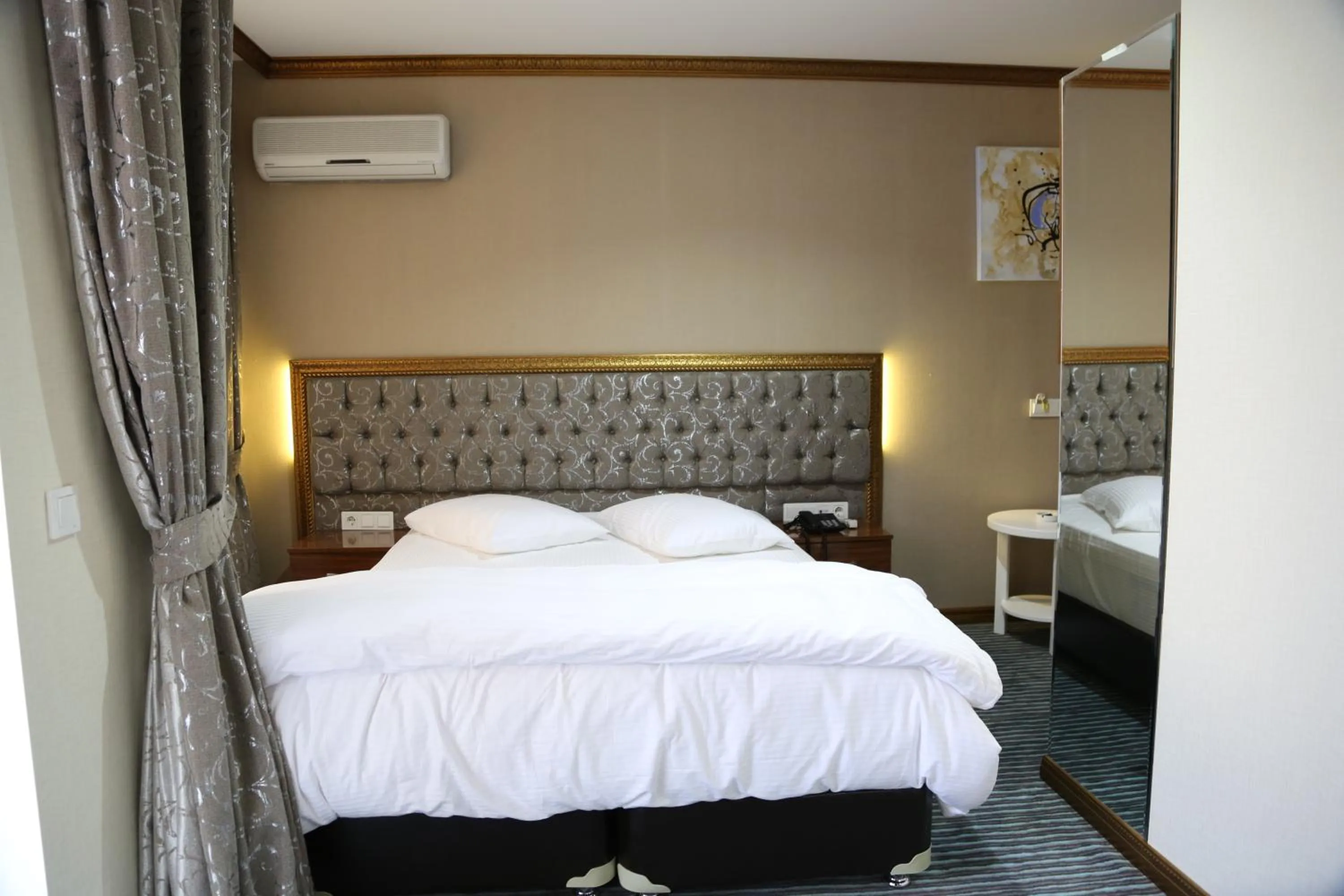 Photo of the whole room, Bed in Grand Sera Hotel