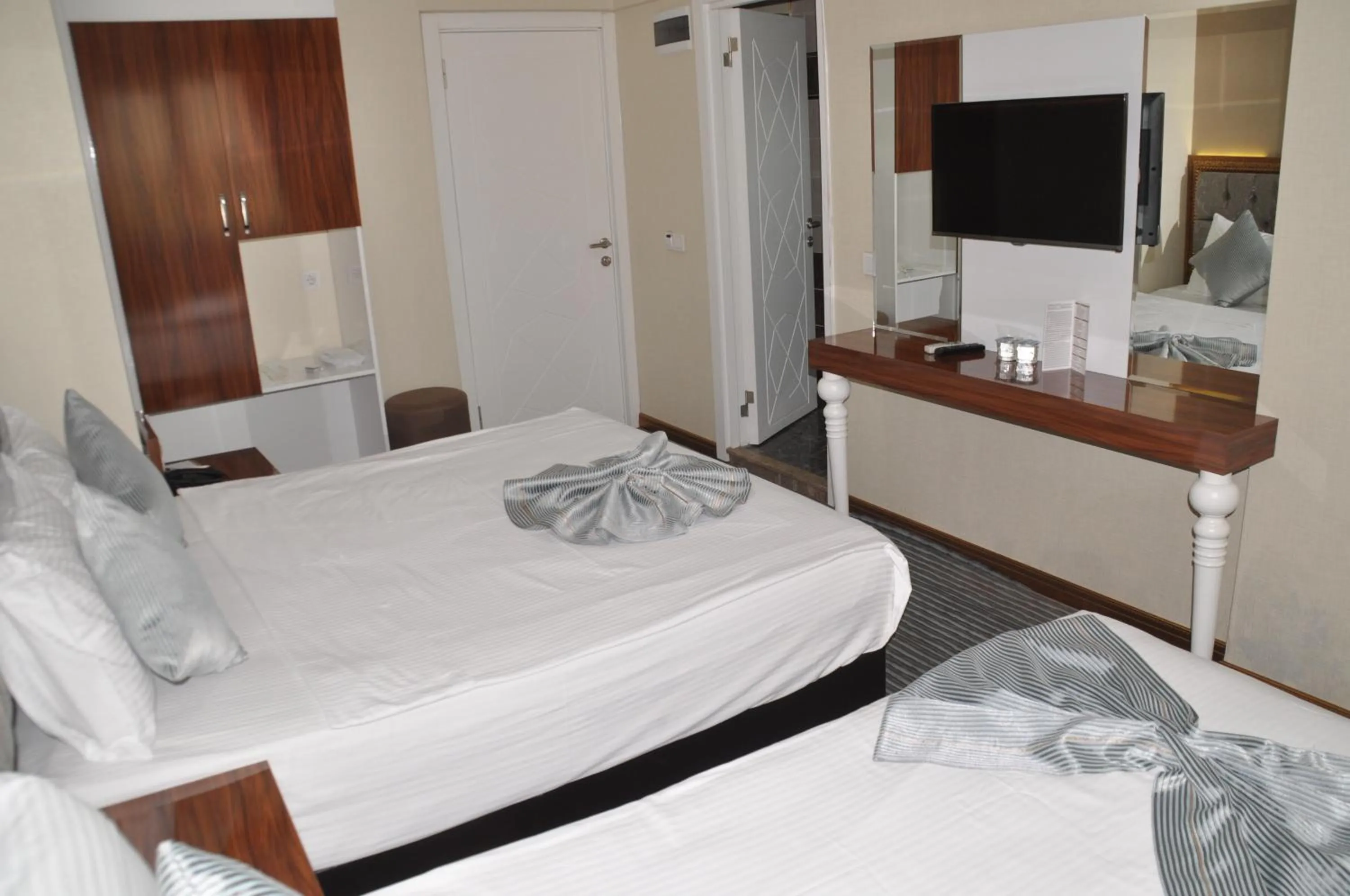 Photo of the whole room, Bed in Grand Sera Hotel