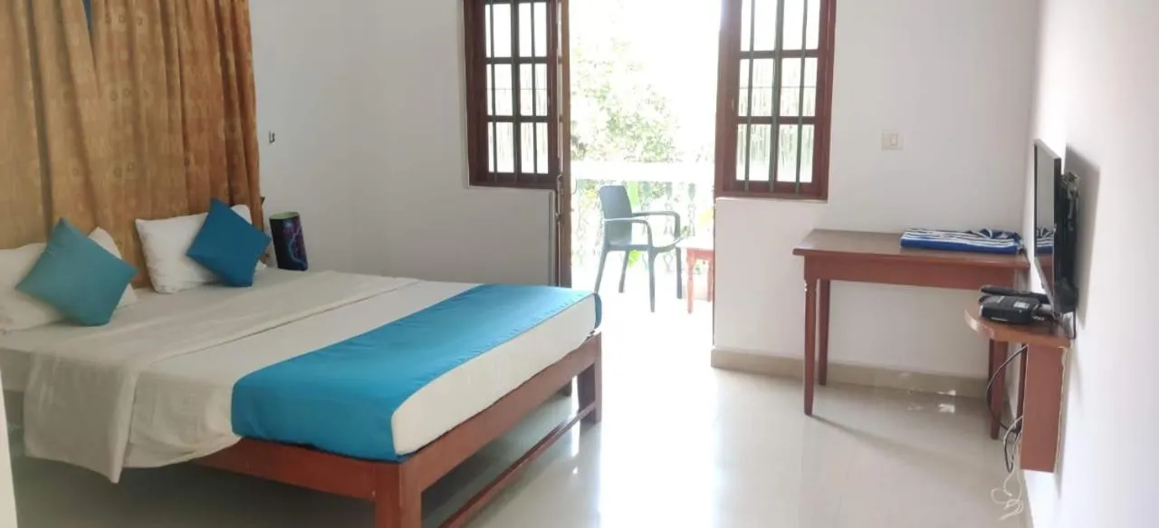 Bed in Pebbles Guesthouse