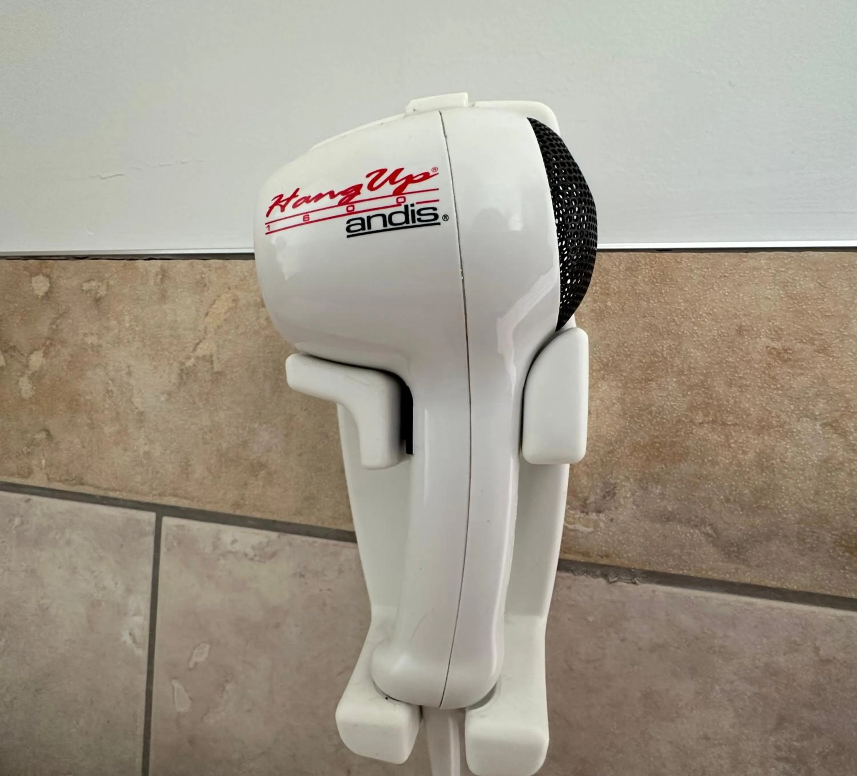 hair dryier in Motel Le Refuge