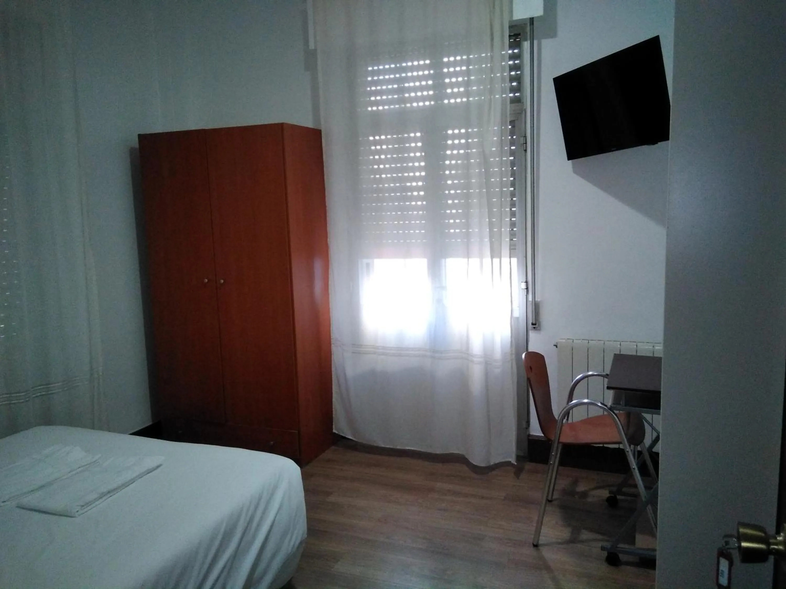 Bed in Hostal Ancla Dorada