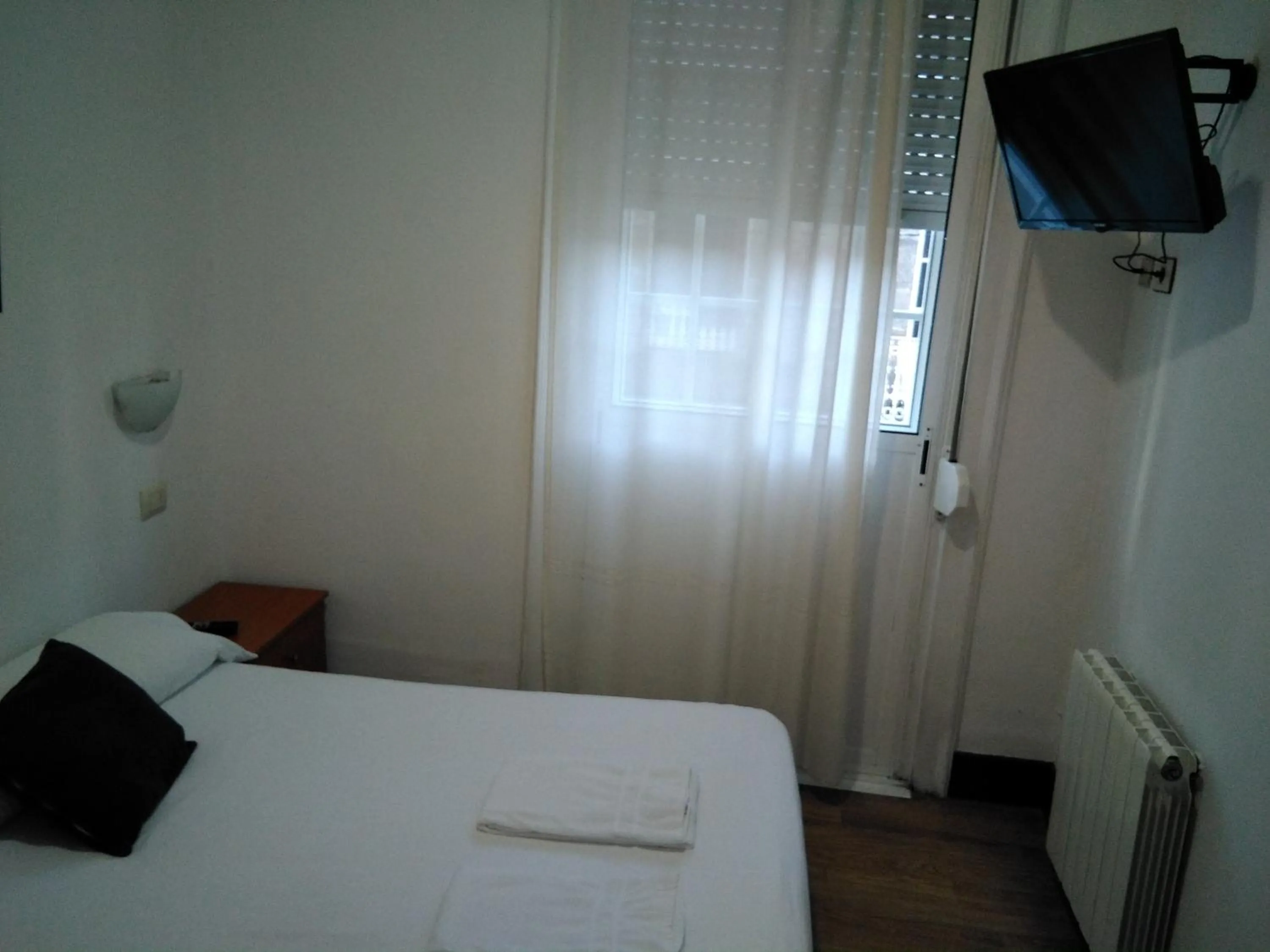 Bed in Hostal Ancla Dorada