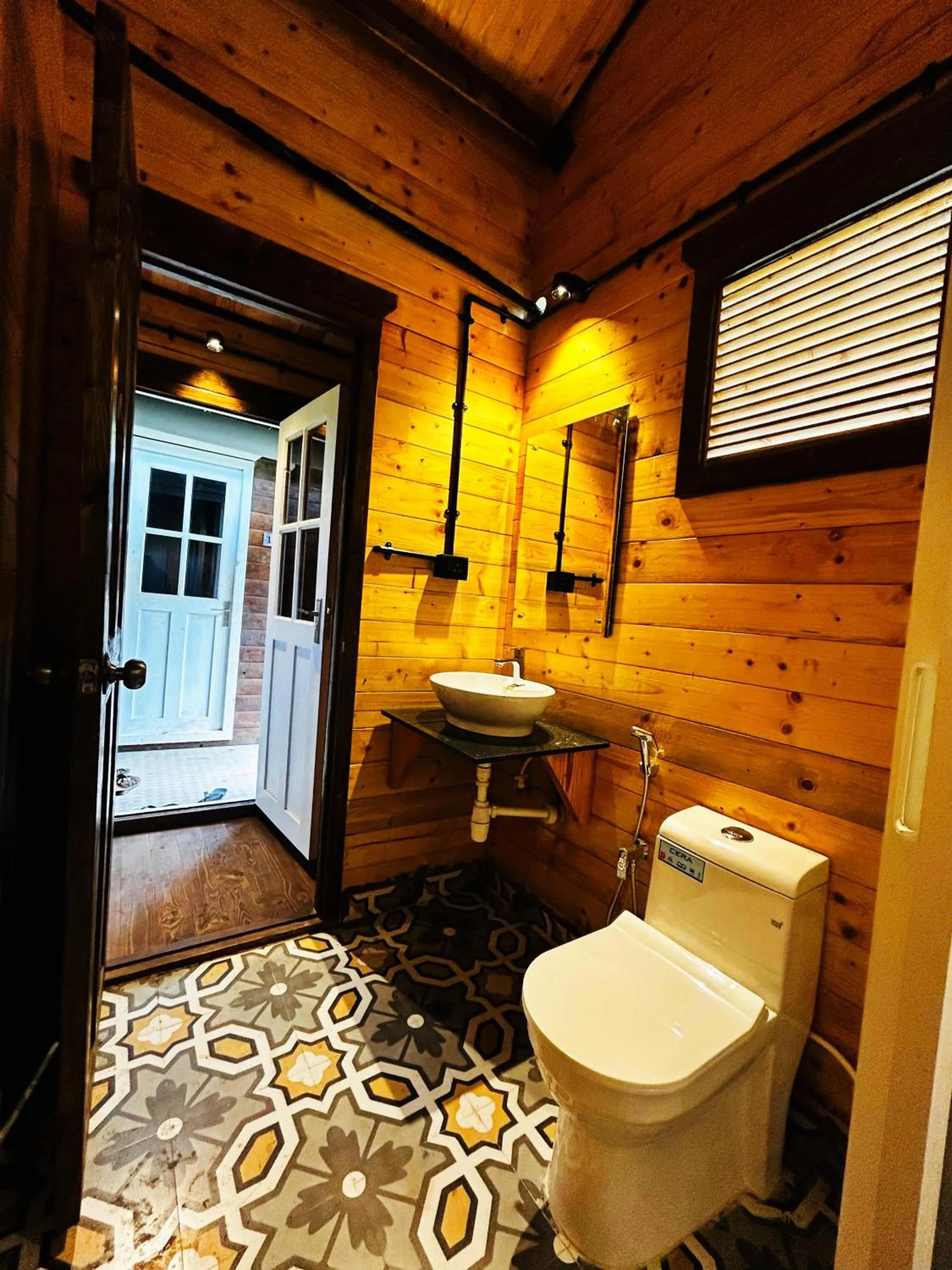 Toilet in Seclude Eco Cottages