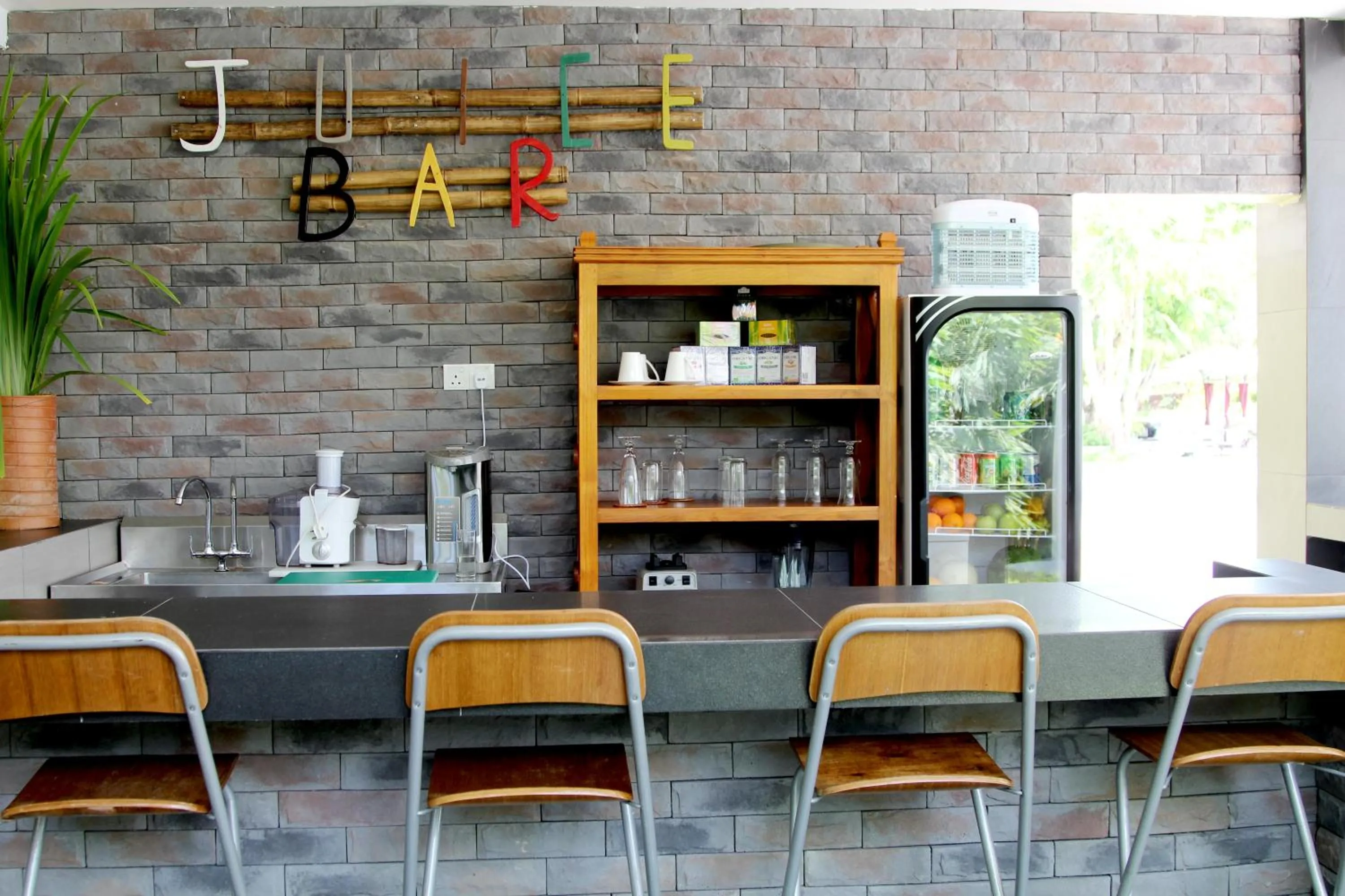 Lounge or bar in The Orchard Wellness & Health Resort