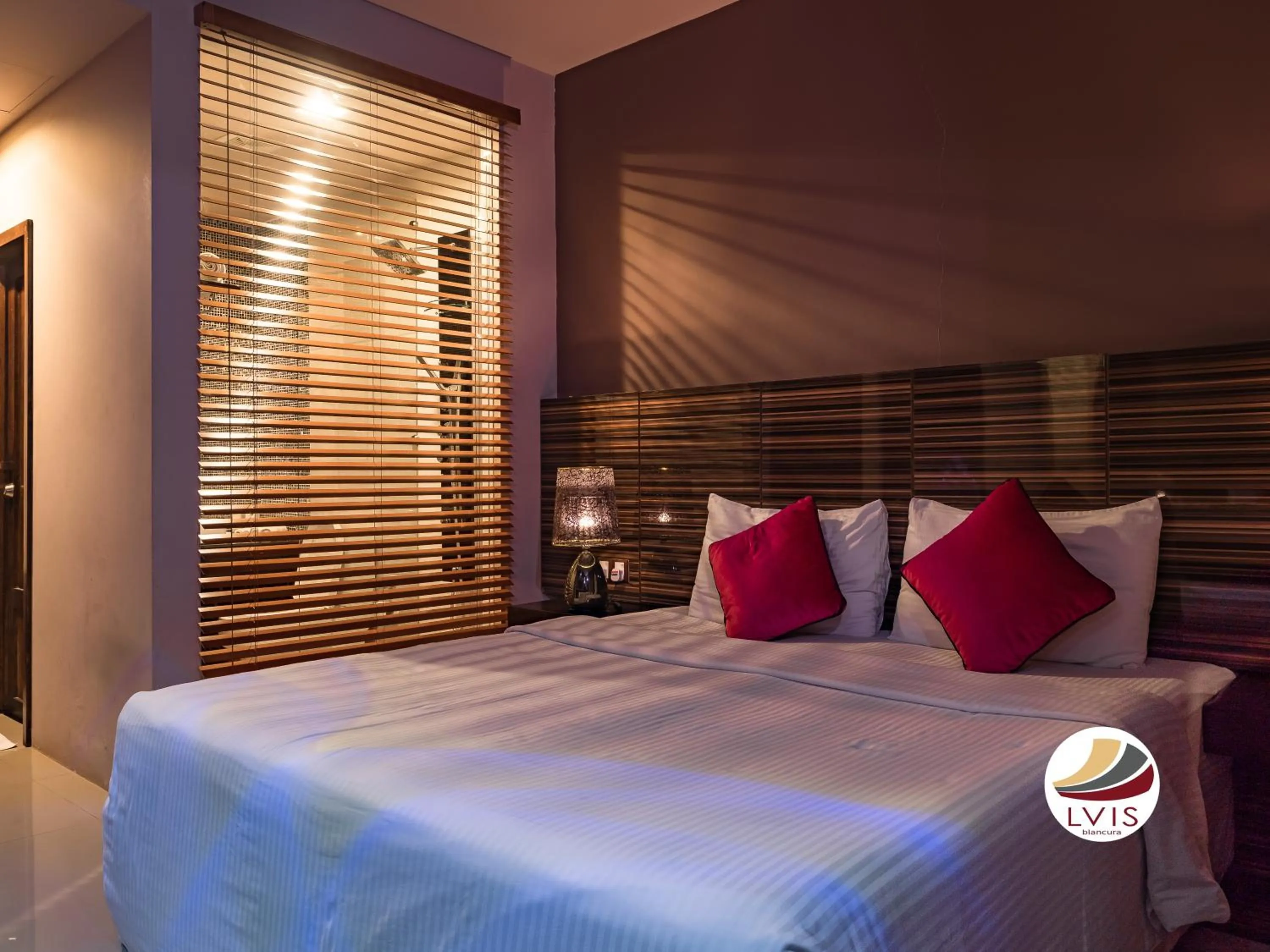 Bed in LVIS blancura Hotel