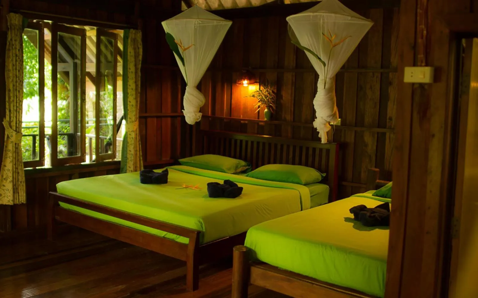 Photo of the whole room, Bed in Khao Sok Riverside Cottages