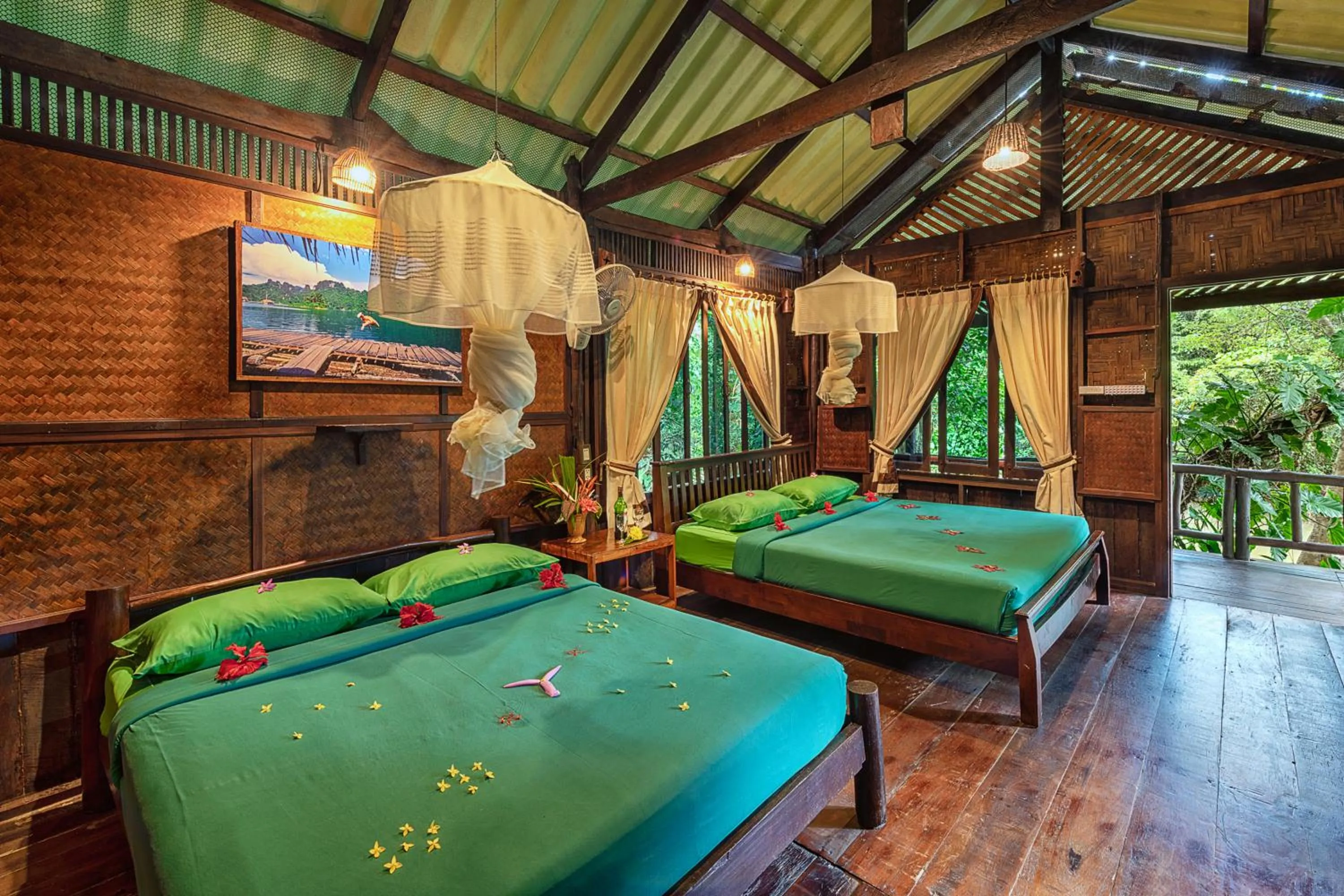 Bed in Khao Sok Riverside Cottages
