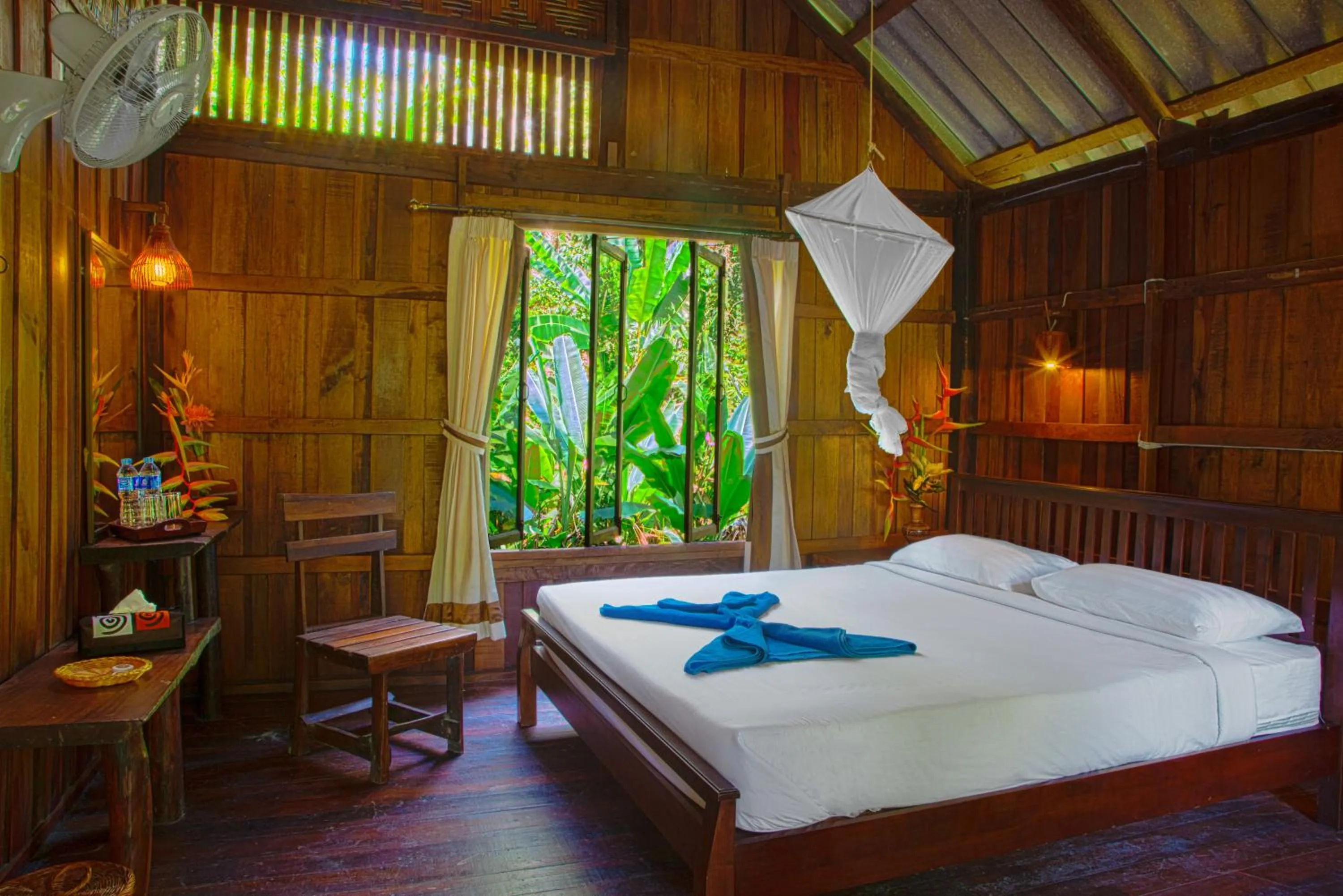 Photo of the whole room, Bed in Khao Sok Riverside Cottages