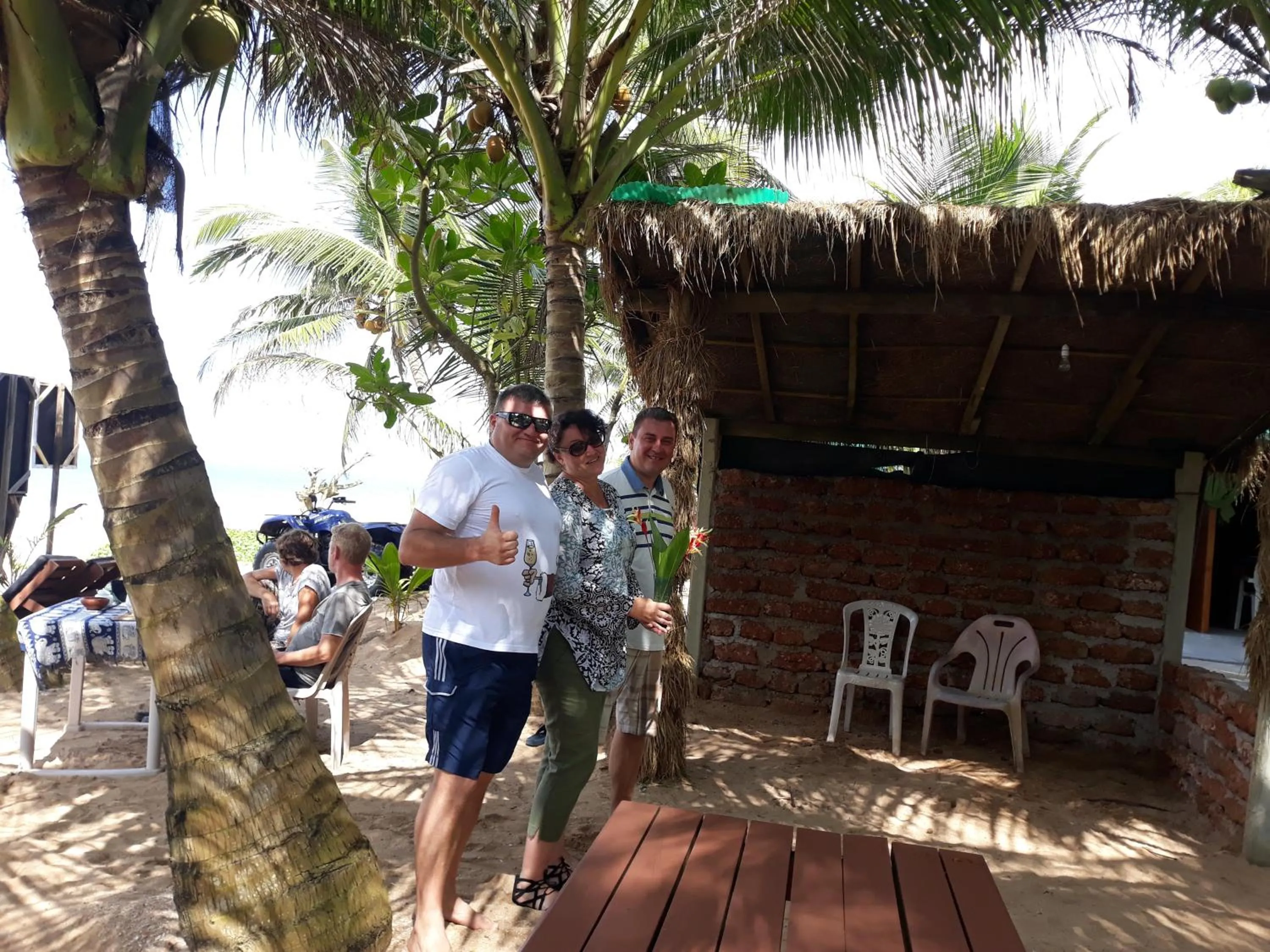 People in Arcade Beach Hotel