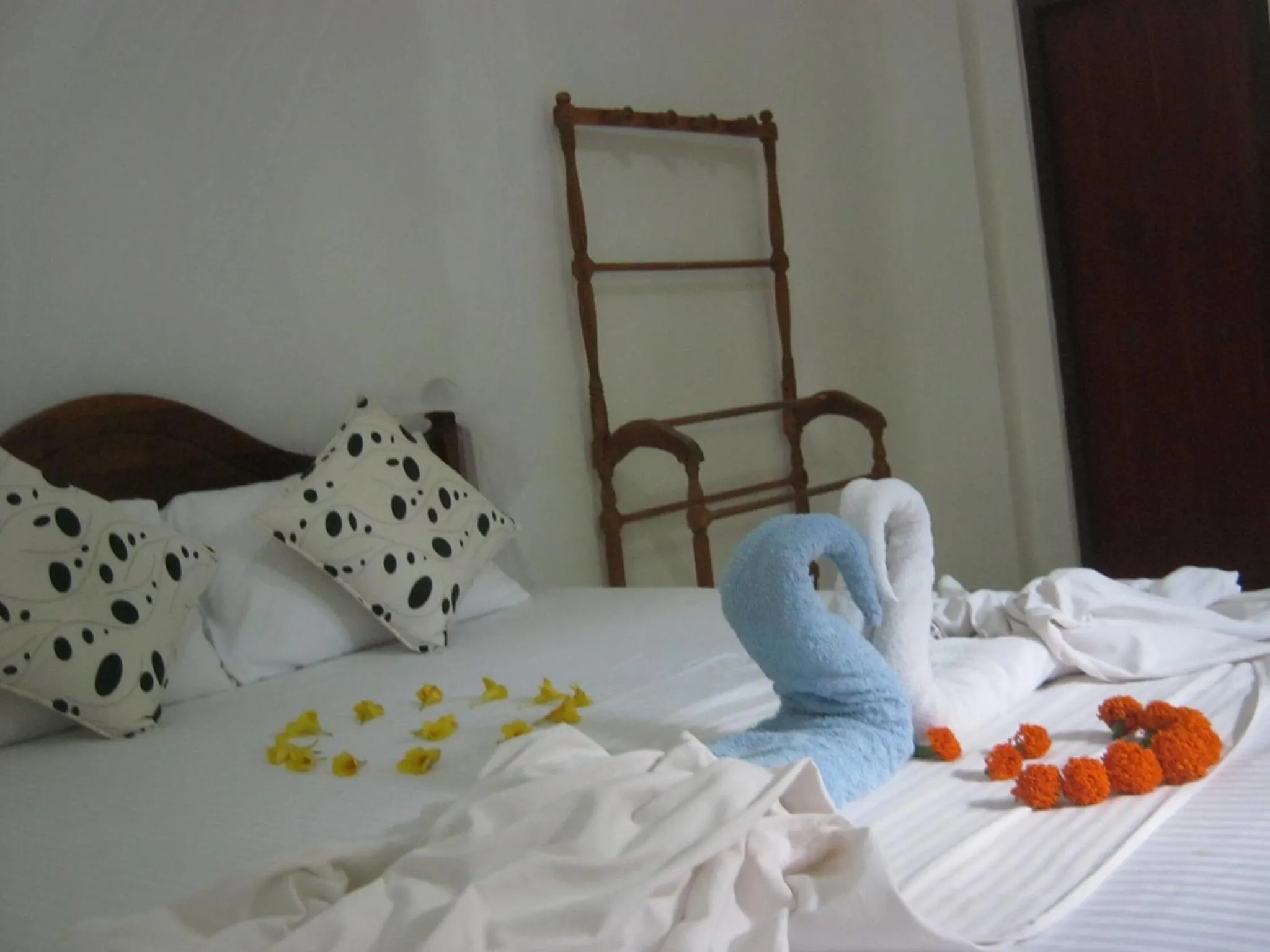 Bed in Arcade Beach Hotel