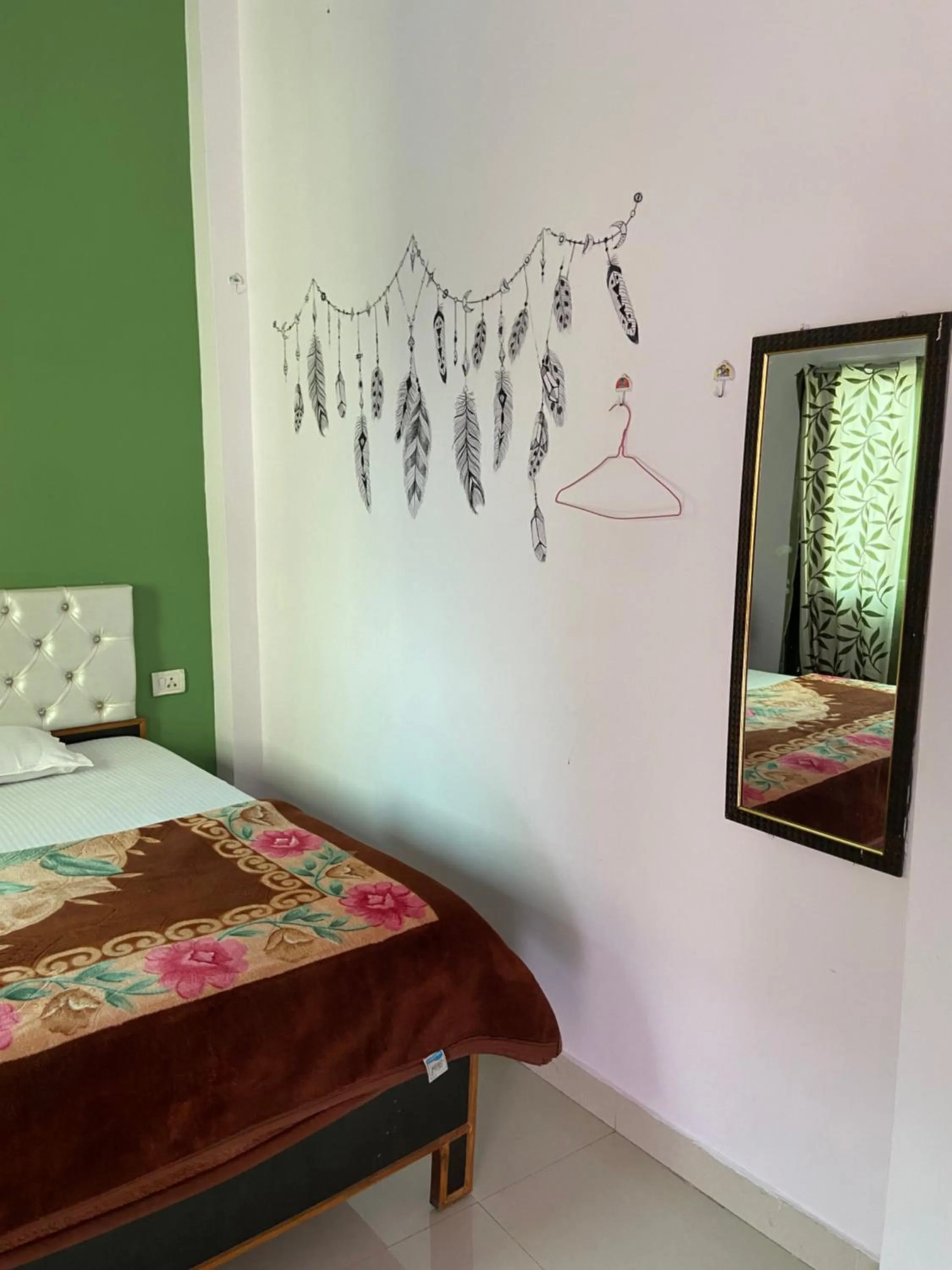Decorative detail, Bed in Banaras Paying Guest House