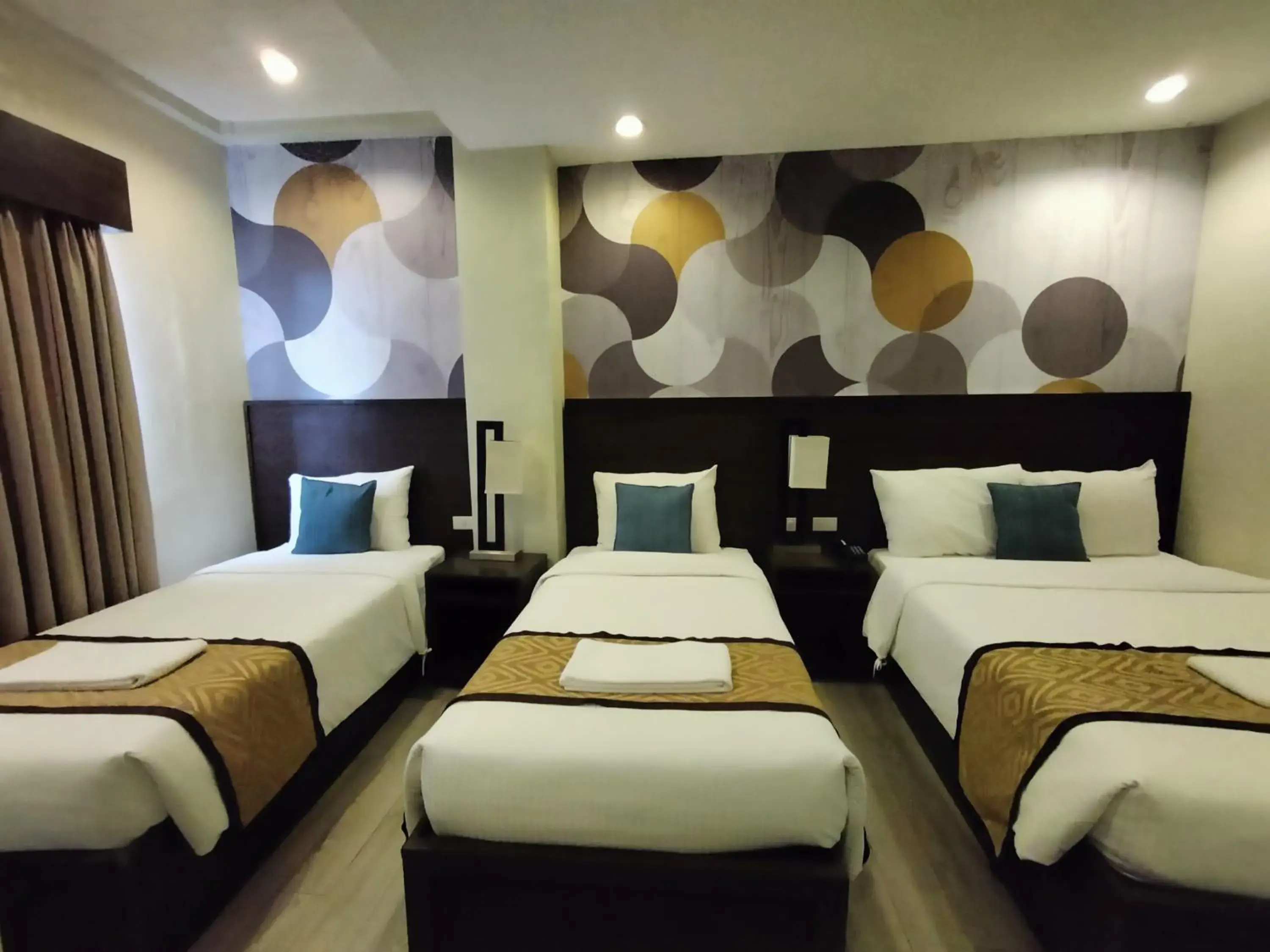 Deluxe Triple Room in Whitewoods Convention and Leisure Hotel by SMS Hospitality Deluxe Triple Room in Whitewoods Convention and Leisure Hotel by SMS Hospitality