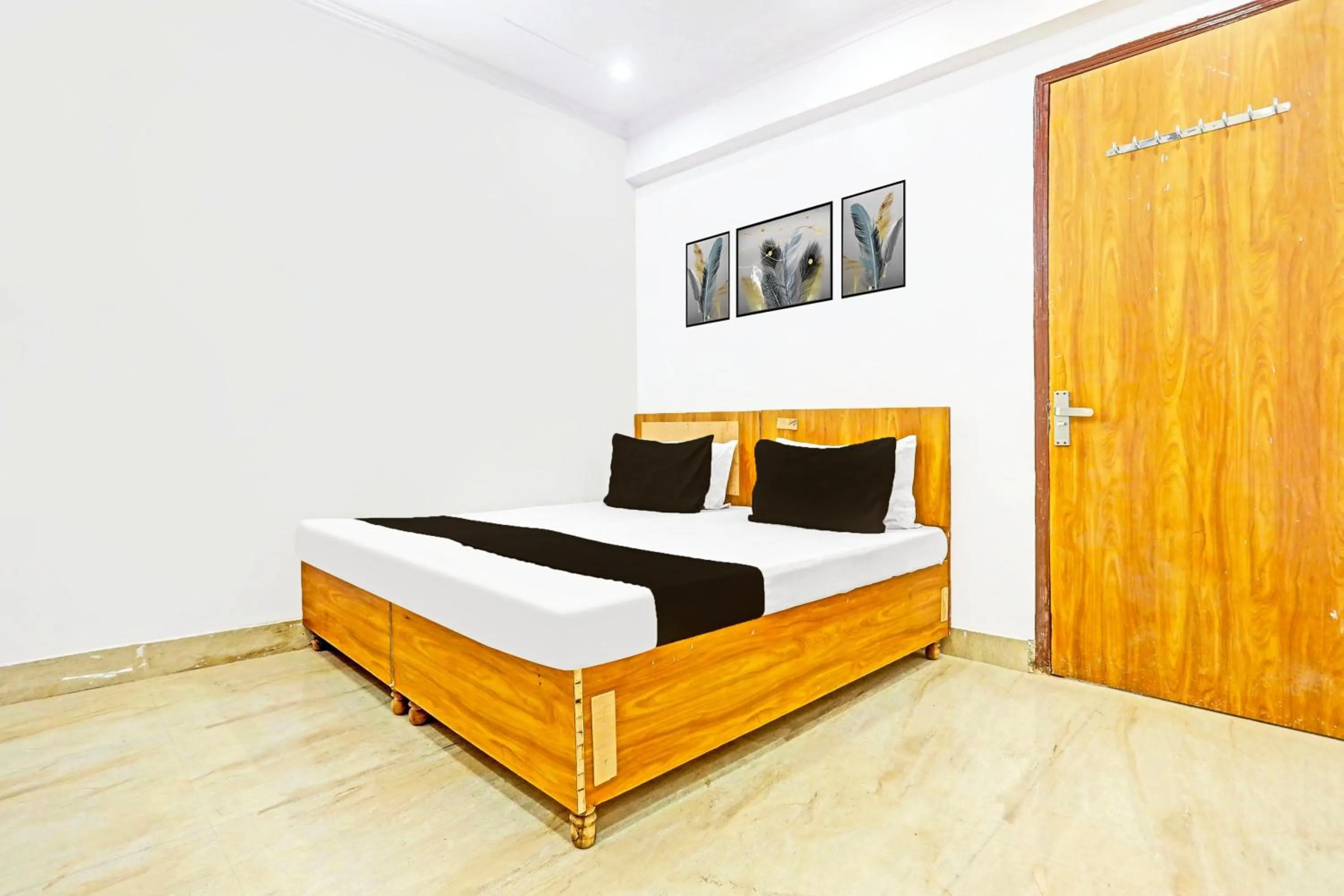 Bedroom in Hotel O High Sky Residency