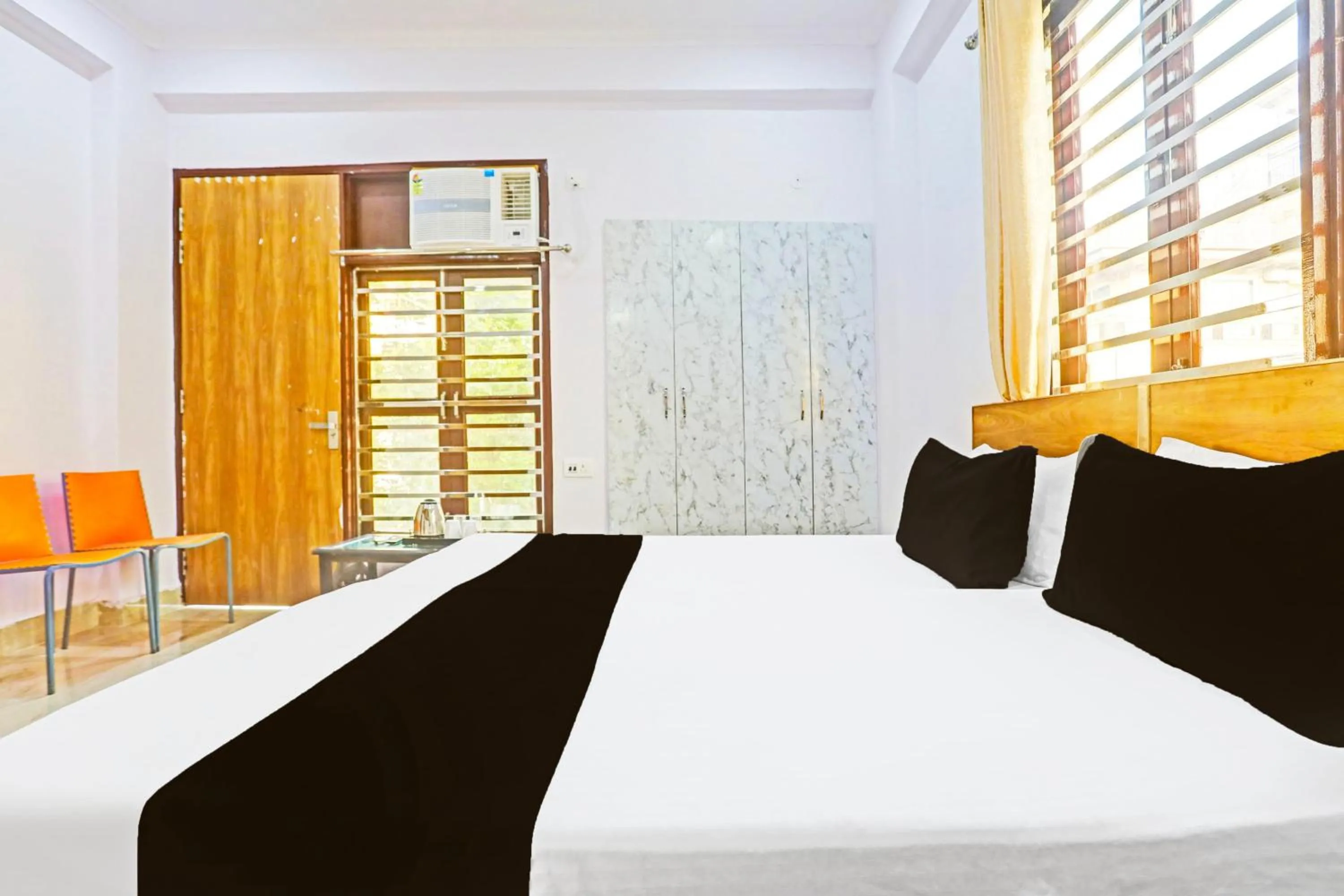 Bedroom in Hotel O High Sky Residency