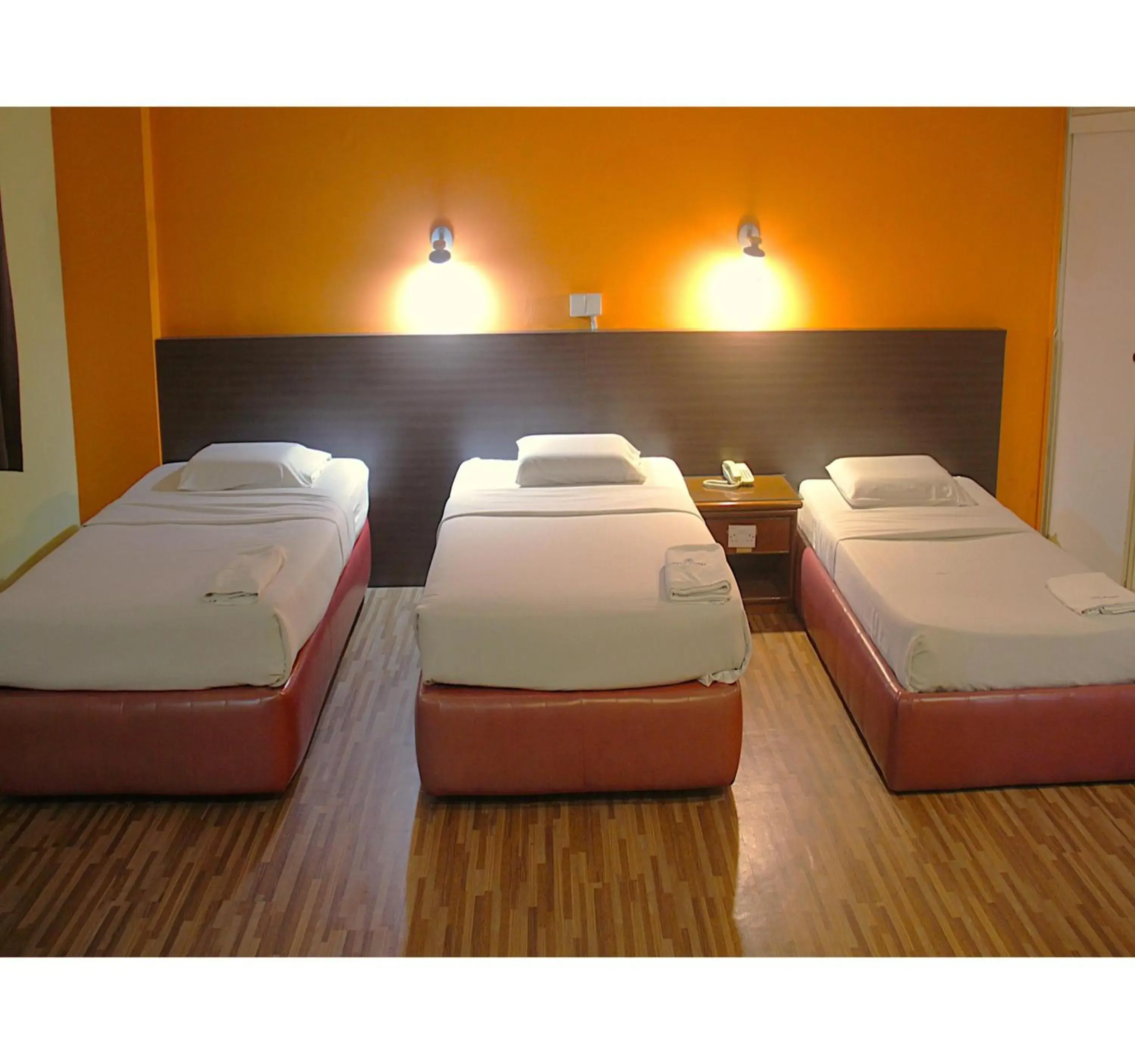 Deluxe Triple Room in Hotel O Hotel Ramai Deluxe Triple Room in Hotel O Hotel Ramai