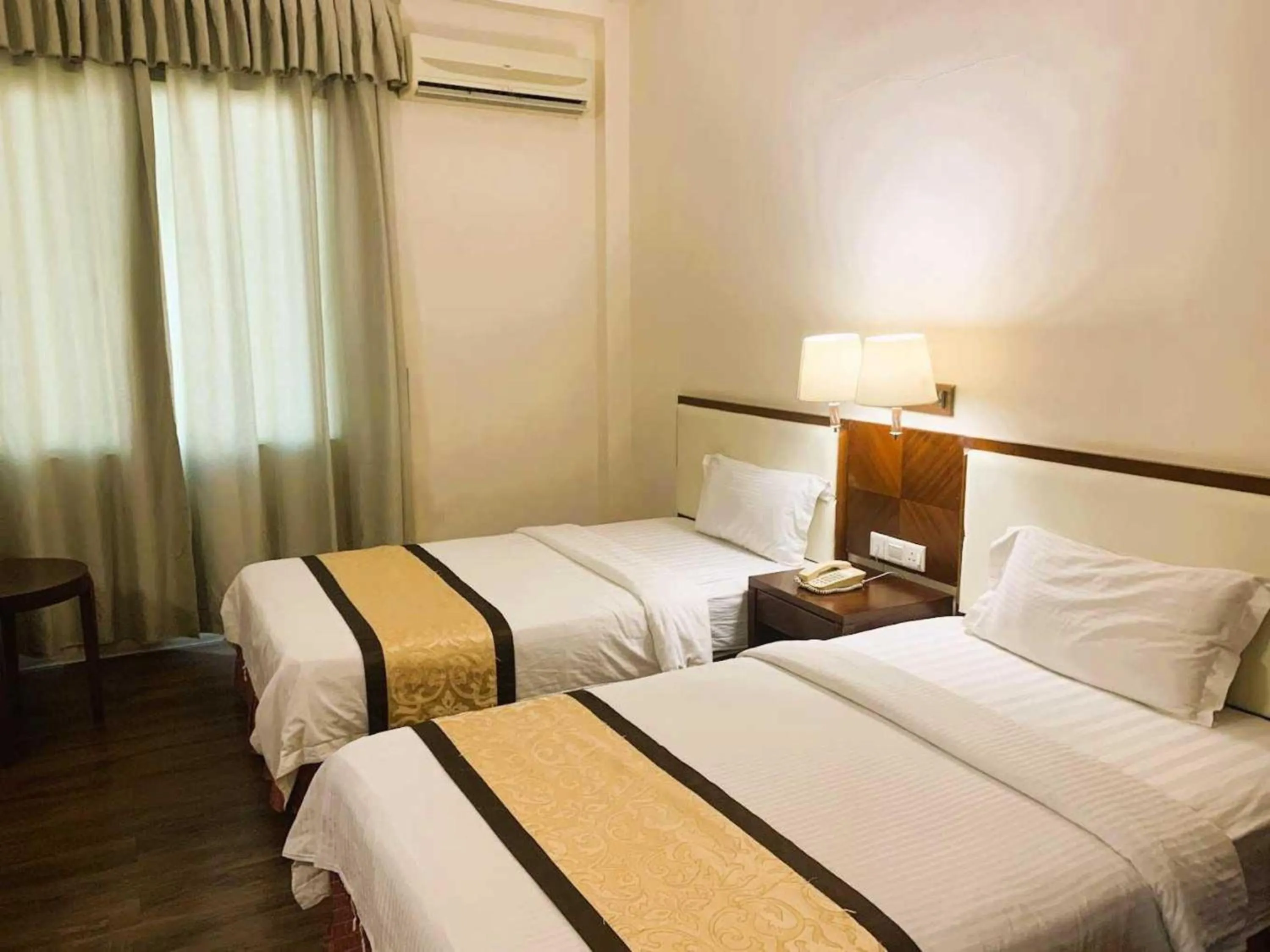 View (from property/room), Bed in Hotel O Atari Inn