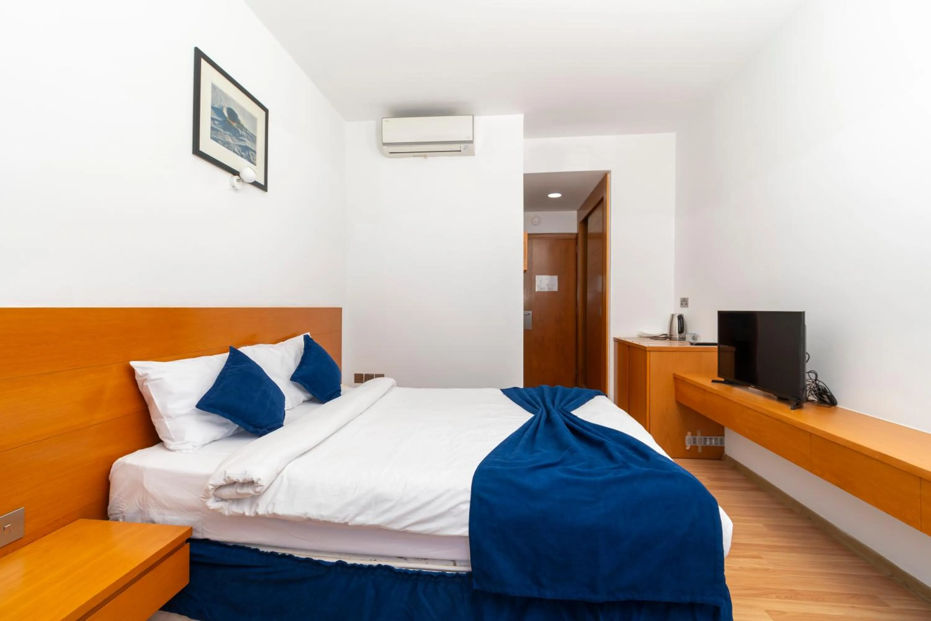 Bed in Bellapais Oasis Hotel