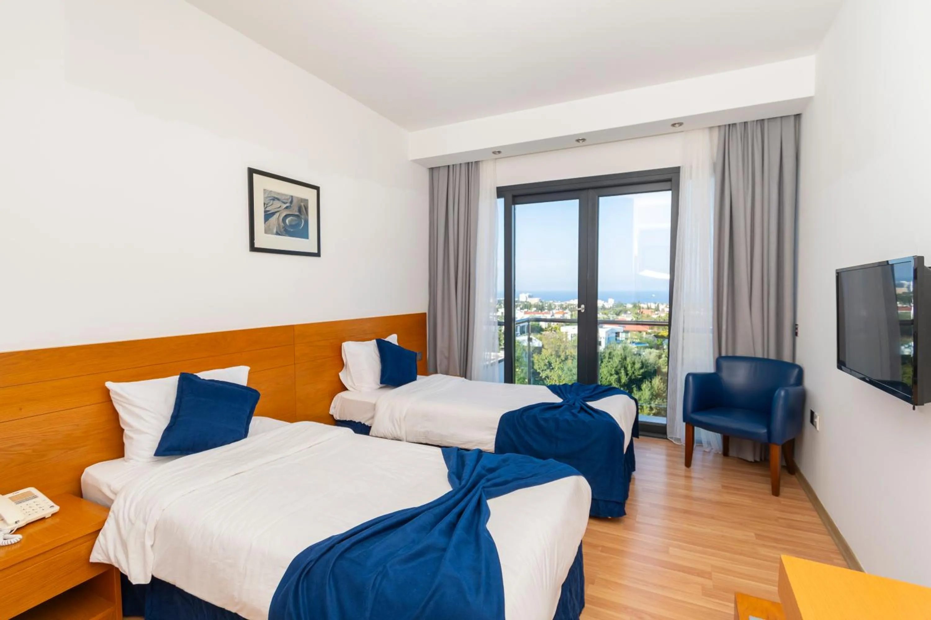 Bed in Bellapais Oasis Hotel