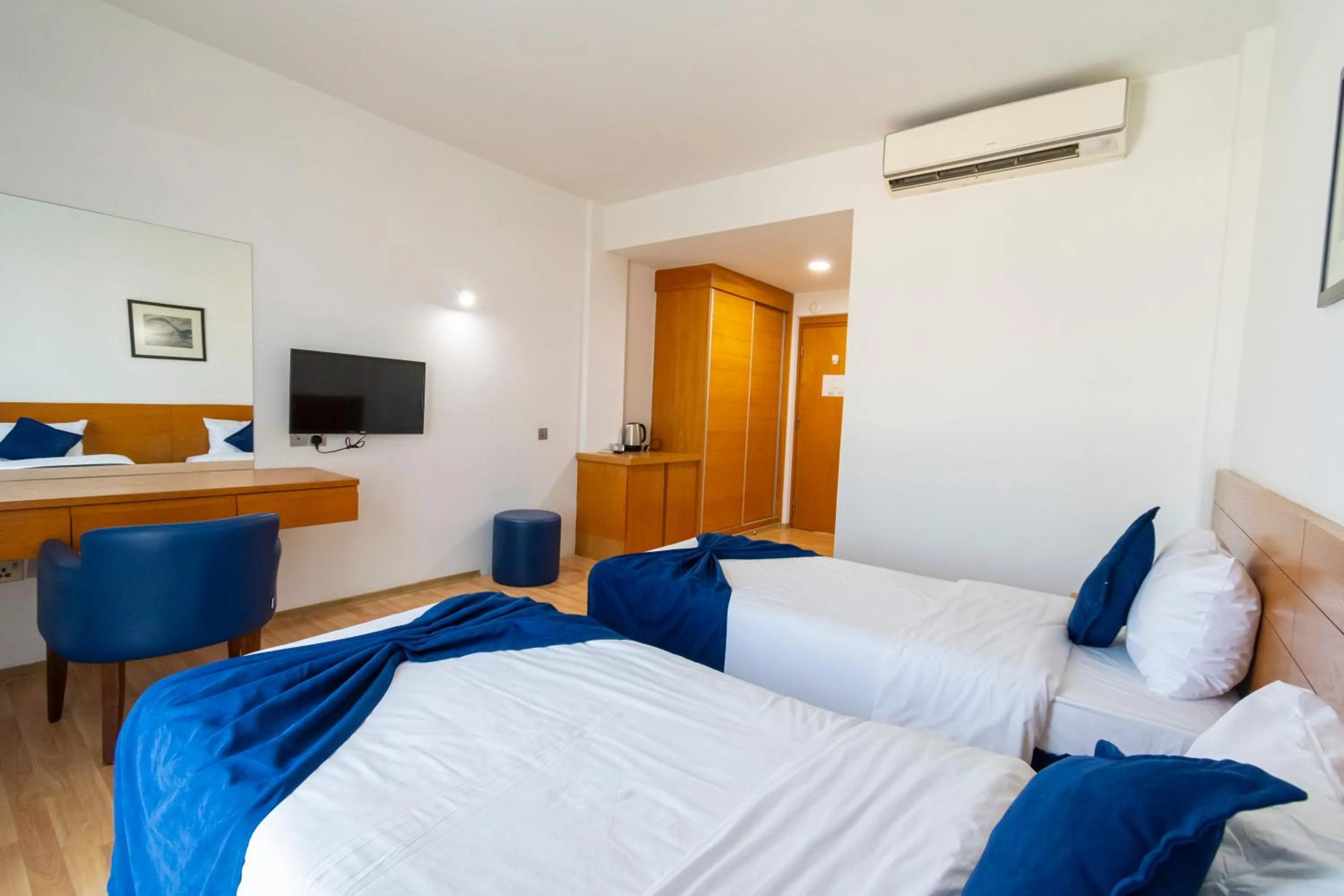 Bed in Bellapais Oasis Hotel