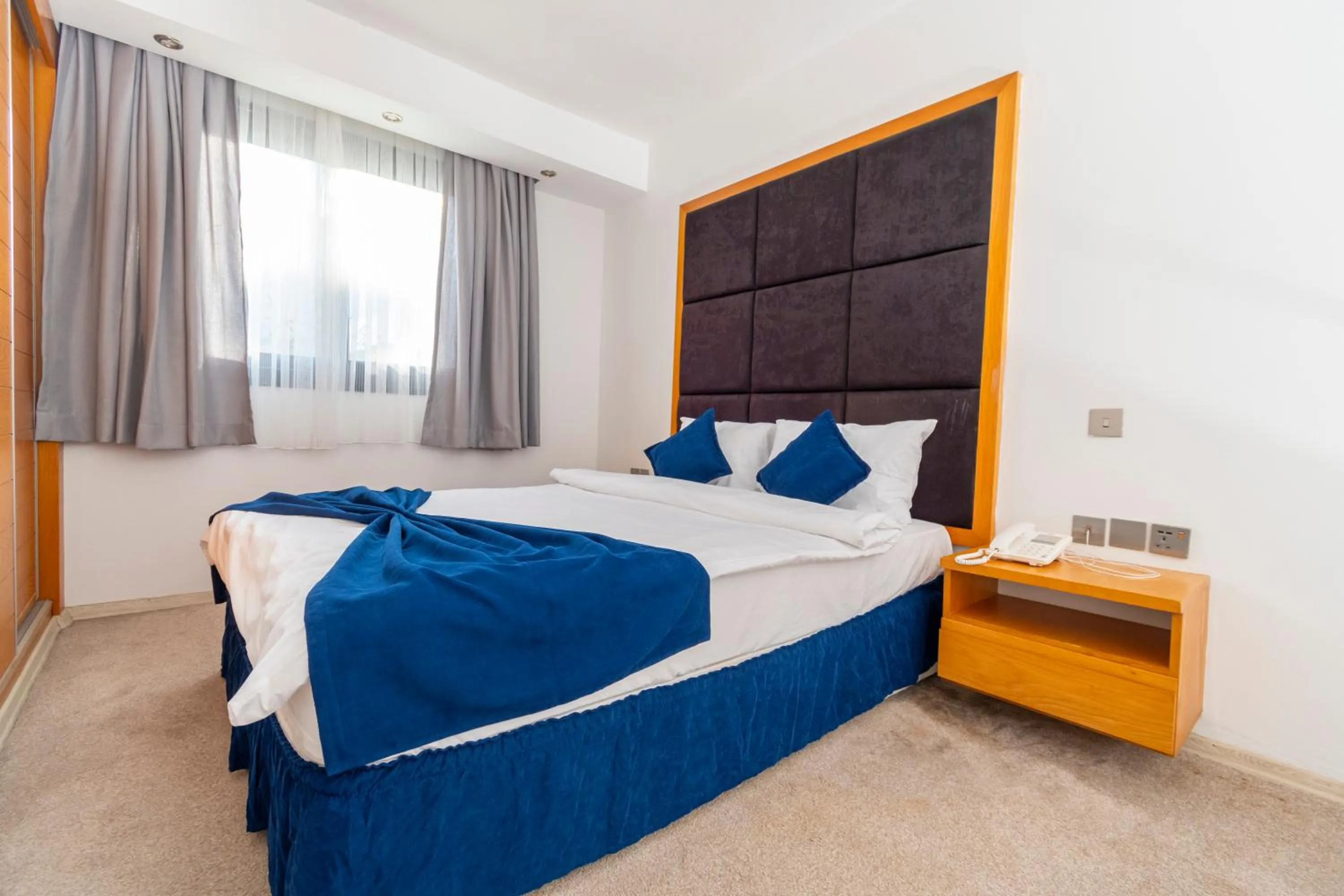 Bed in Bellapais Oasis Hotel