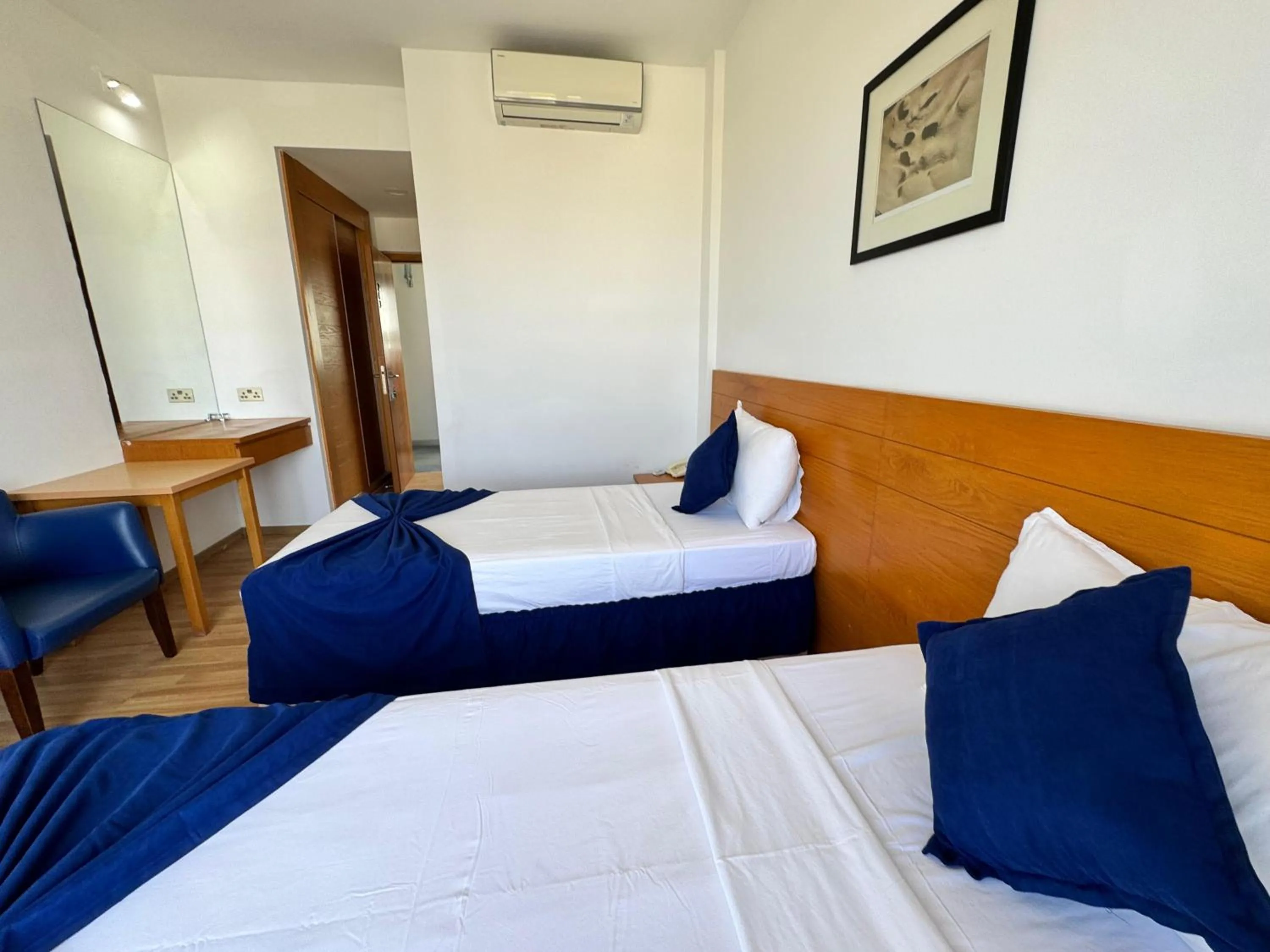 Bed in Bellapais Oasis Hotel