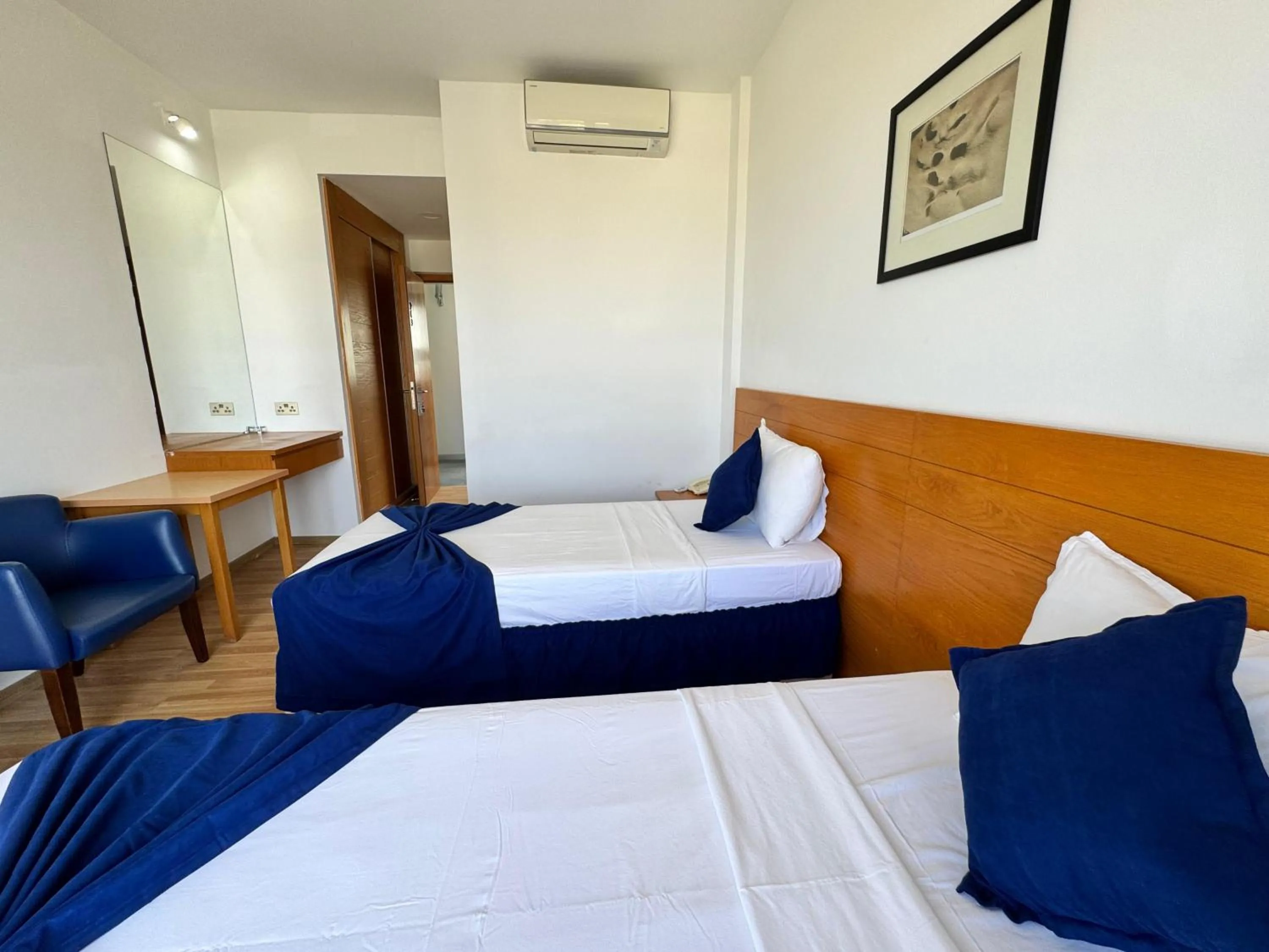 Bed in Bellapais Oasis Hotel