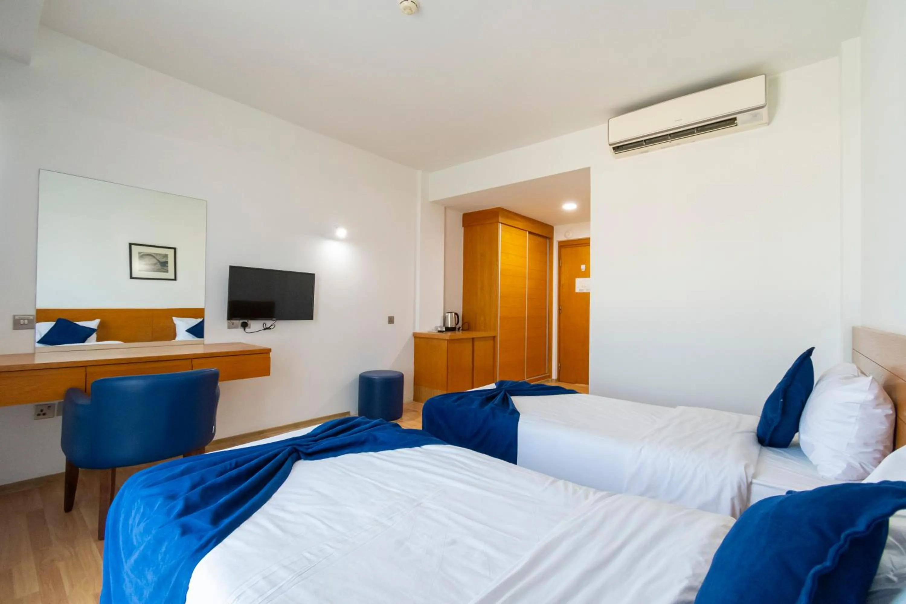 Bed in Bellapais Oasis Hotel