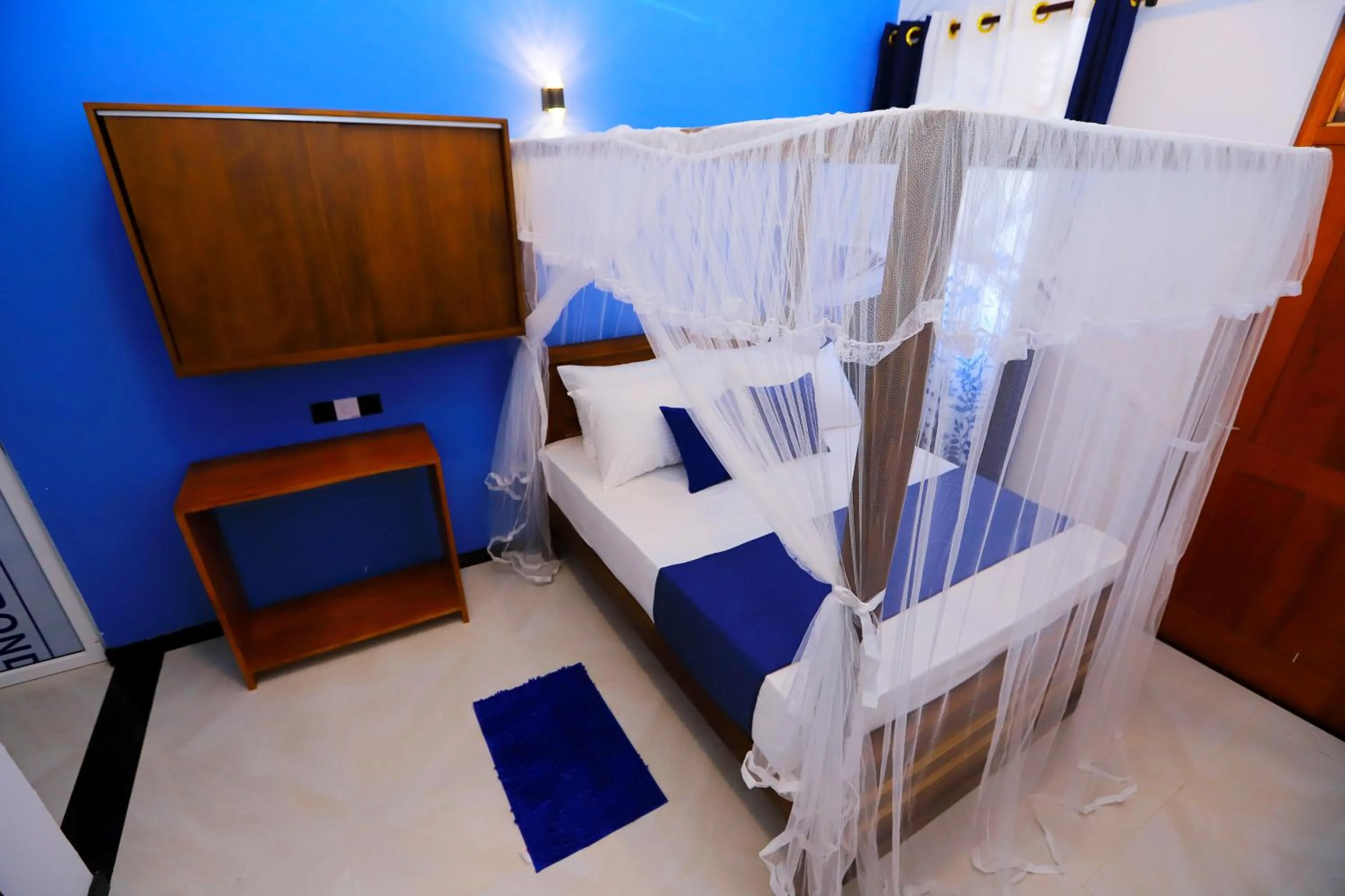 Photo of the whole room, Bed in Dinsara Pearl Villa