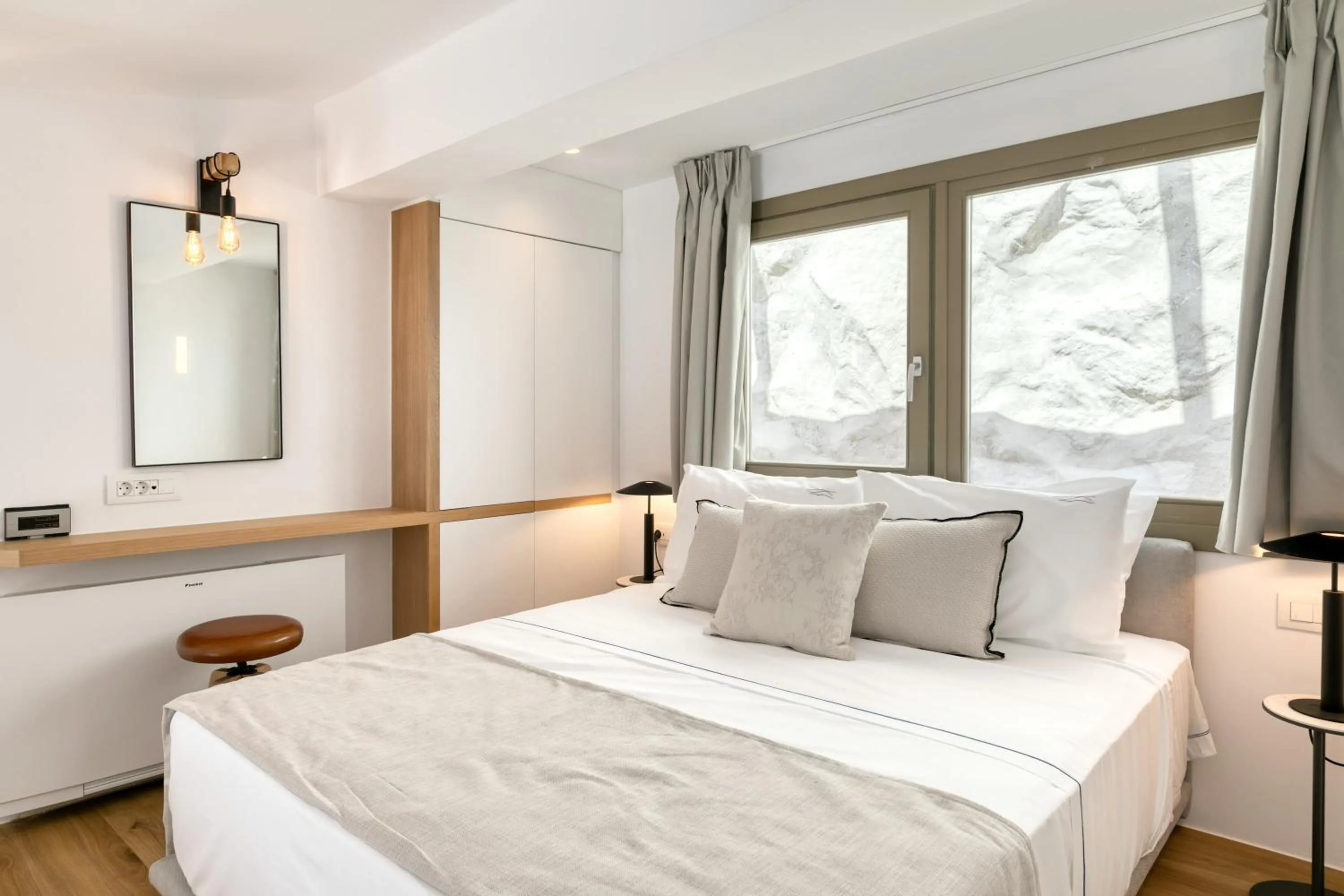 Bed in Nasta Suites & Villas Intentional Living Mykonos