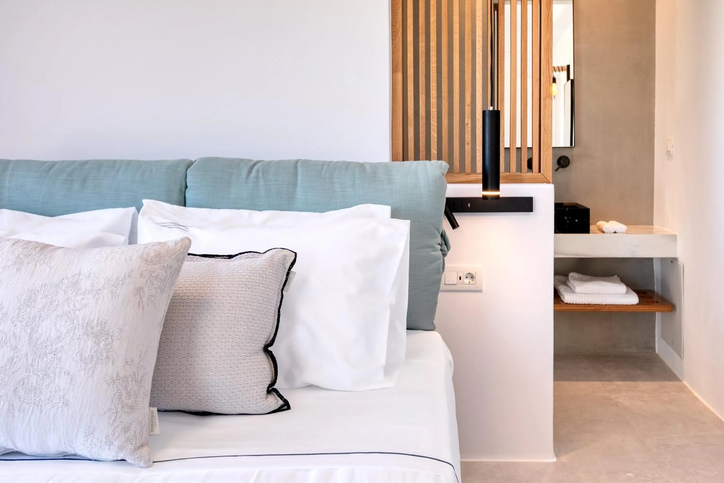 Bed in Nasta Suites & Villas Intentional Living Mykonos